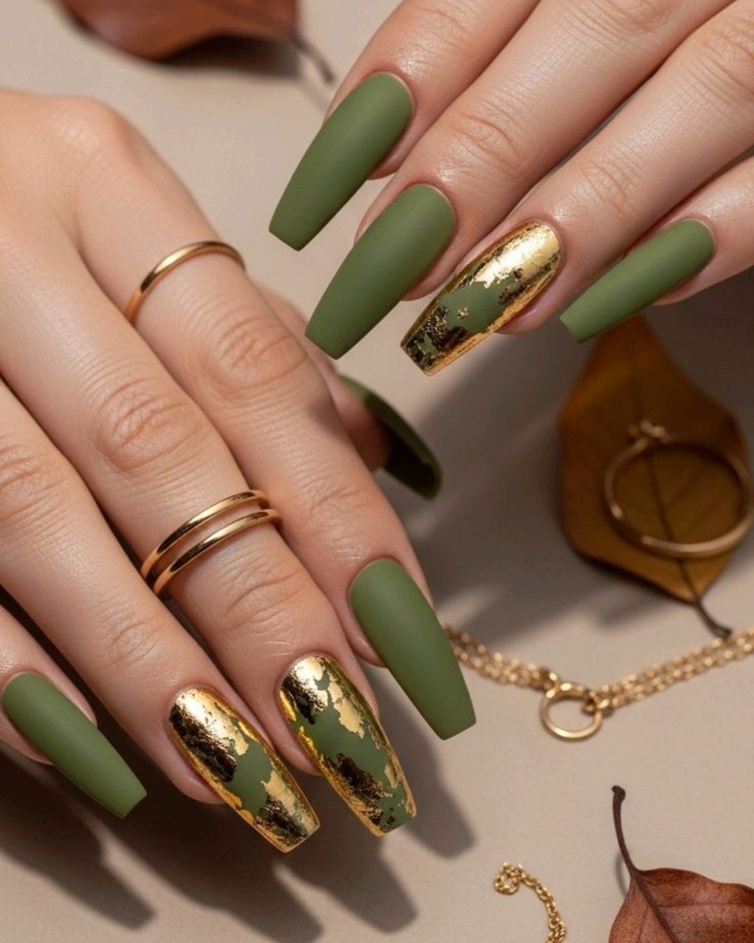 Deep Green Nails with Tiny Gold Starbursts