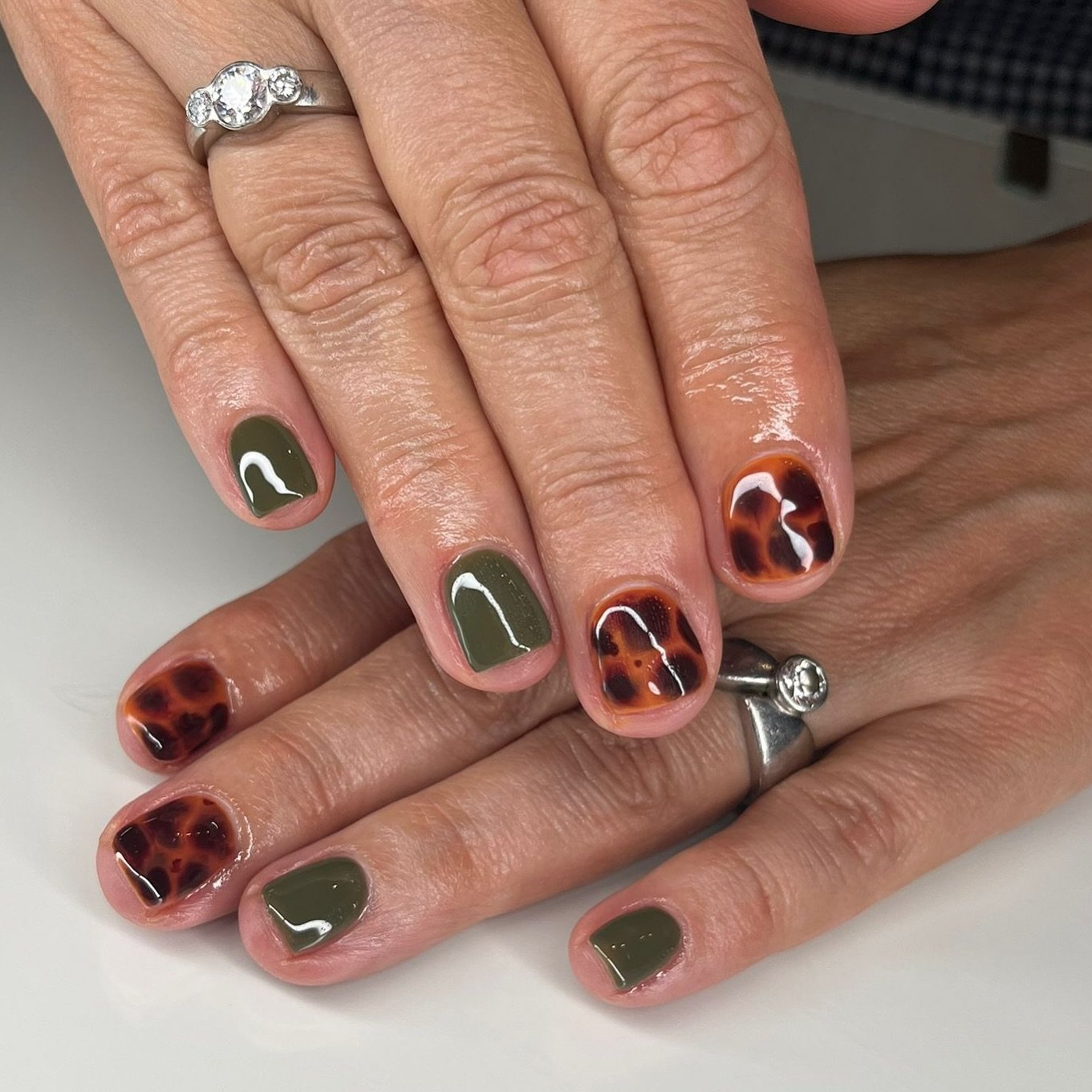 brown tortoiseshell and olive green nails