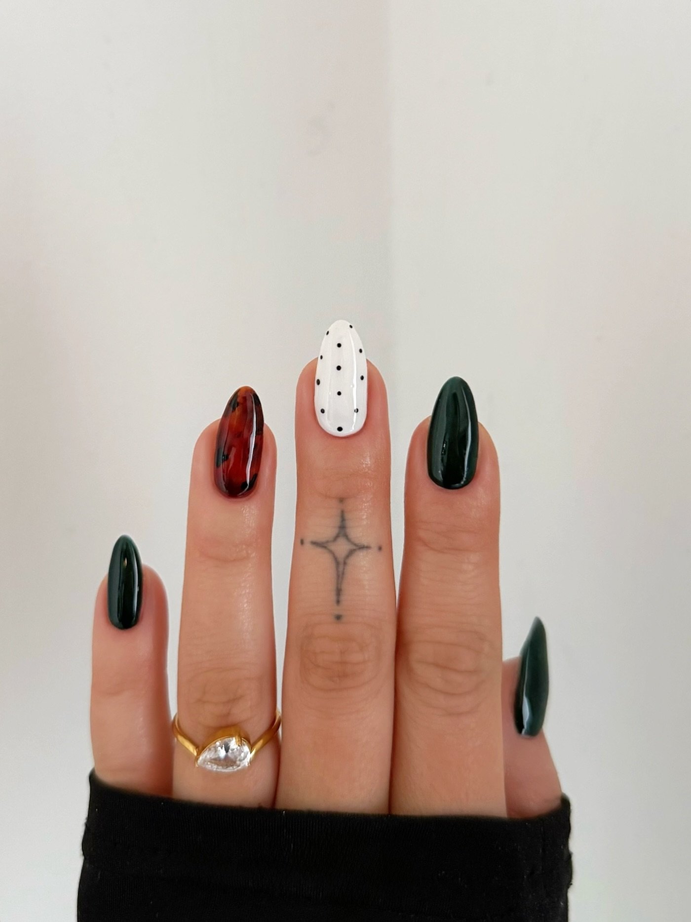 green and brown almond nails with minimal accents