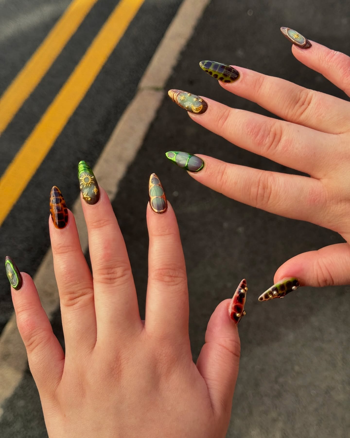 green and brown long almond nails