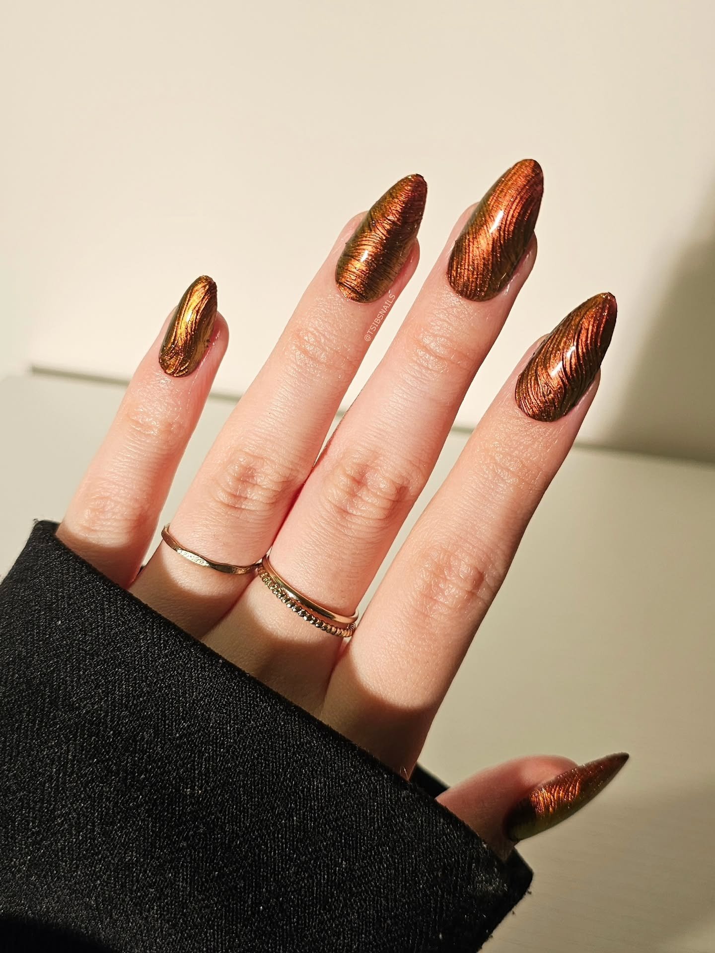 copper brown ribbed chrome stiletto nails