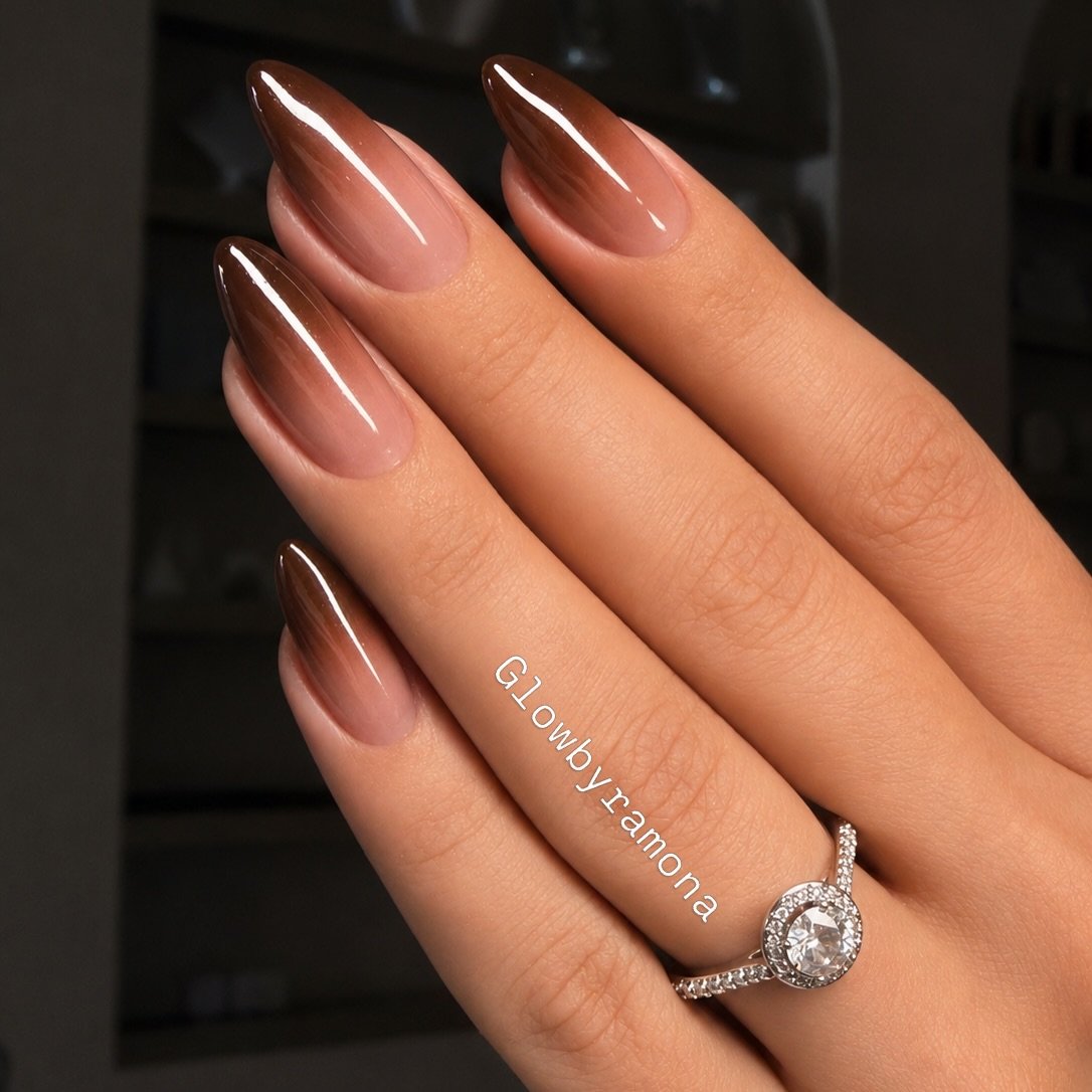 sheer pink almond nails with brown chrome ombre tips