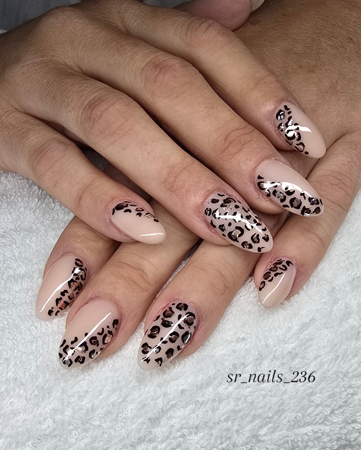 Sheer Nude Leopard Almond Nails