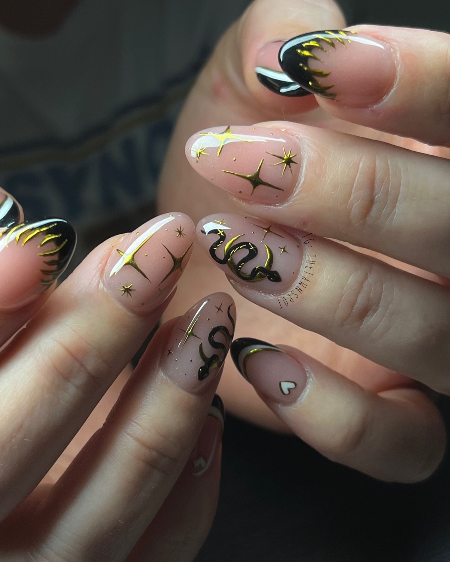 Neutral Leo Nails with Green and Black Accents