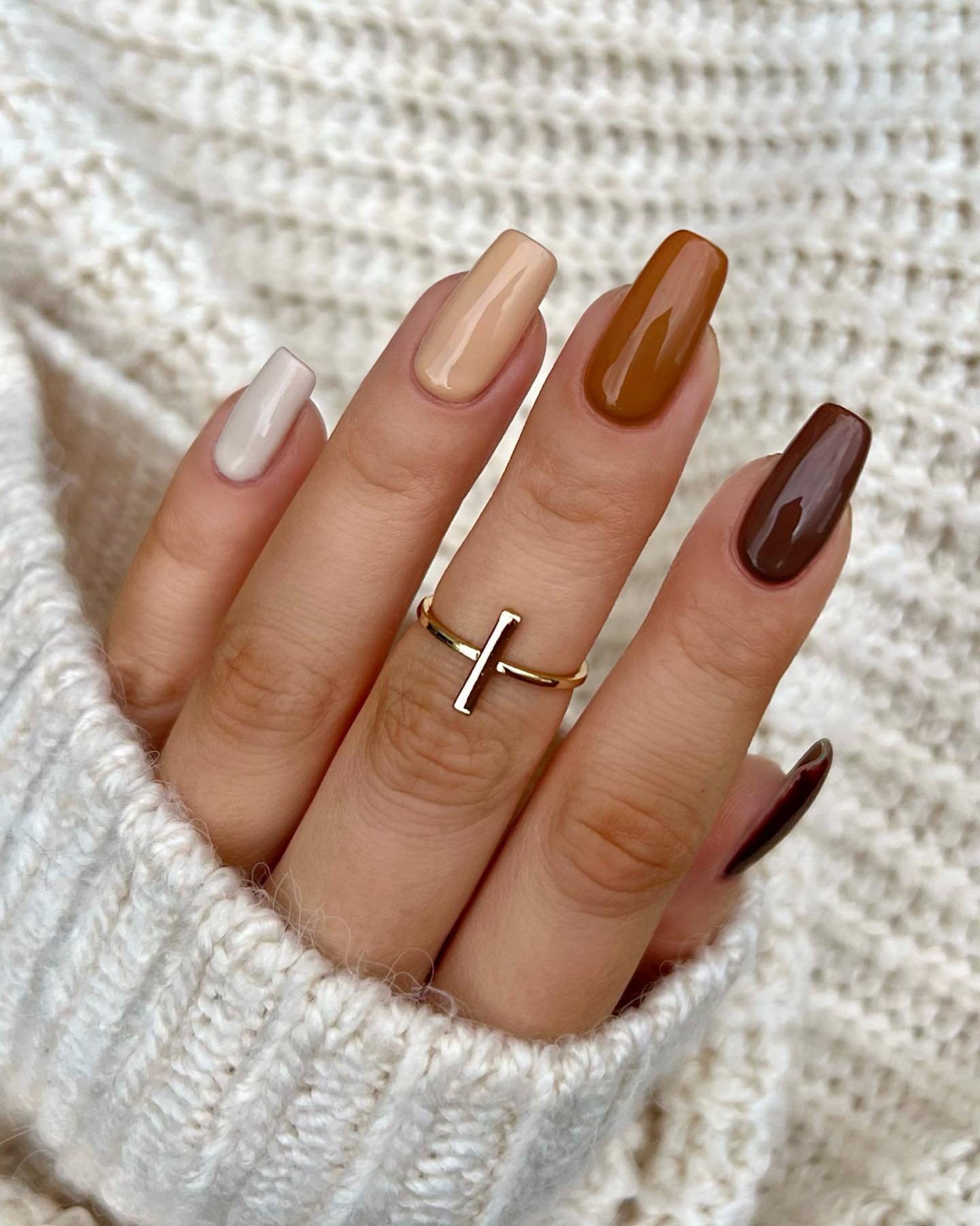 Neutral Almond Nails with White, Brown, and Copper Tips