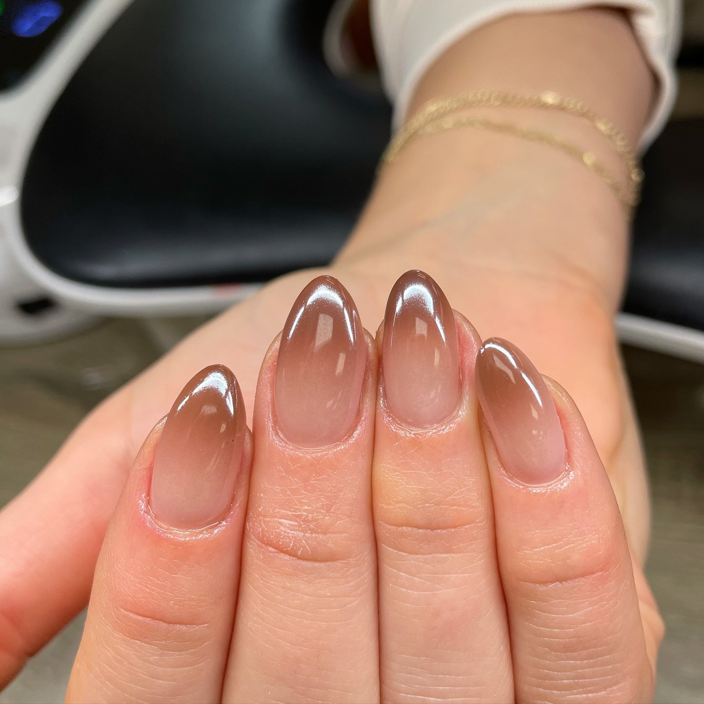 Sheer Nude Almond Nails with Subtle Brown Edging