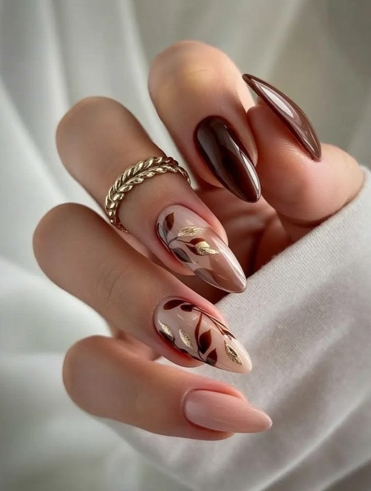 Brown and Nude Almond Nails with Curved Floral-Like Accents