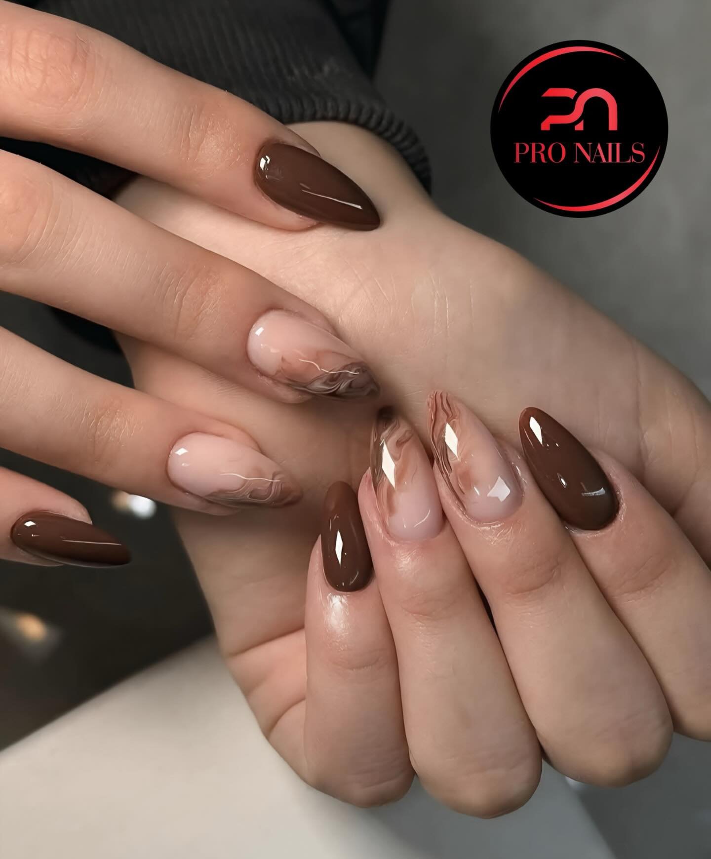 Brown and Nude Almond Nails with Sculpted Accent Details