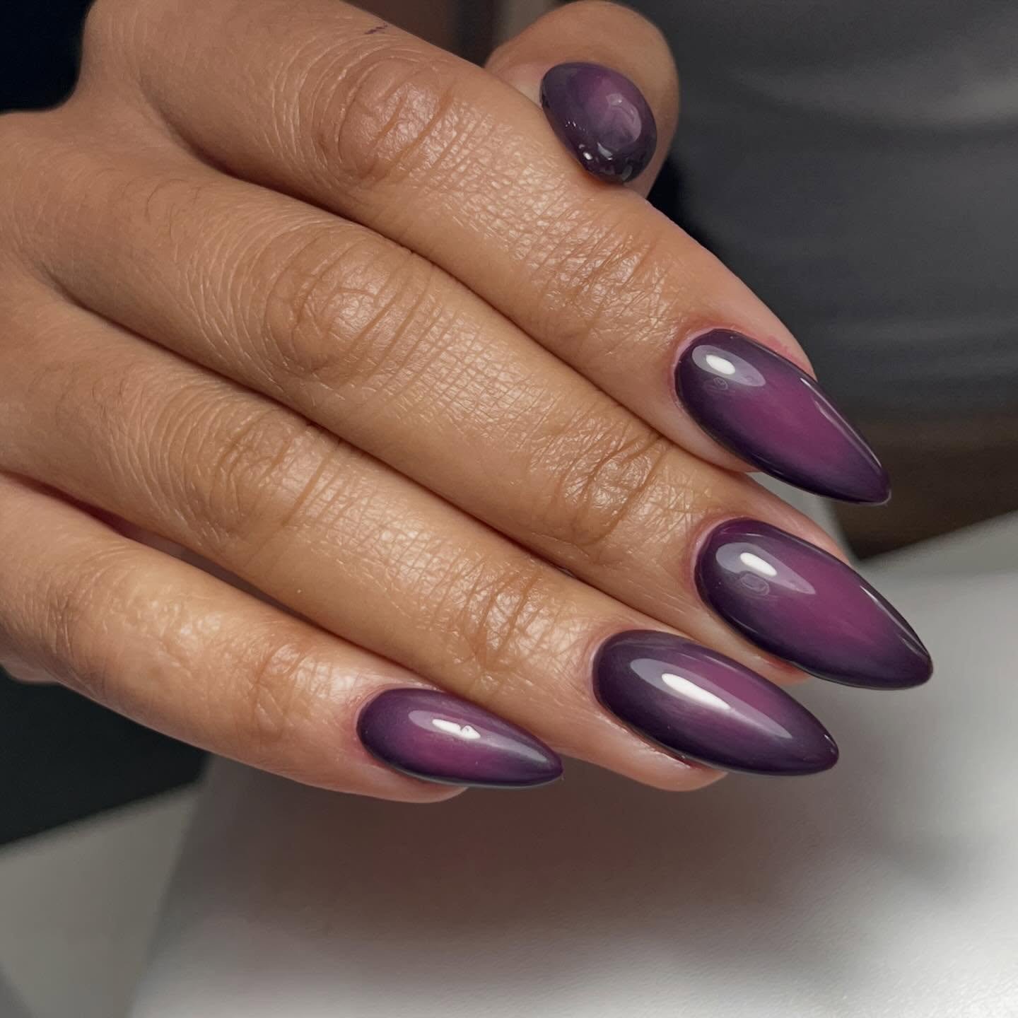 Glossy Plum Almond Nails