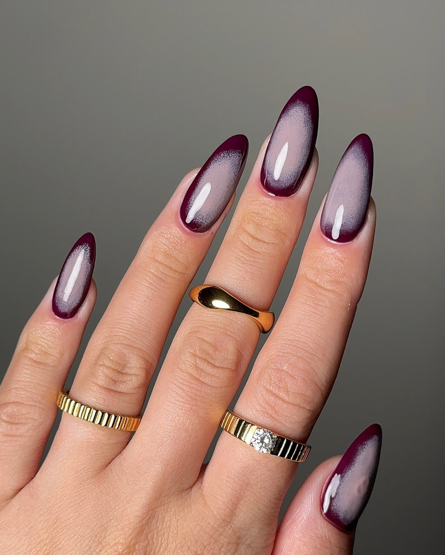 Plum Aura Almond Nails
