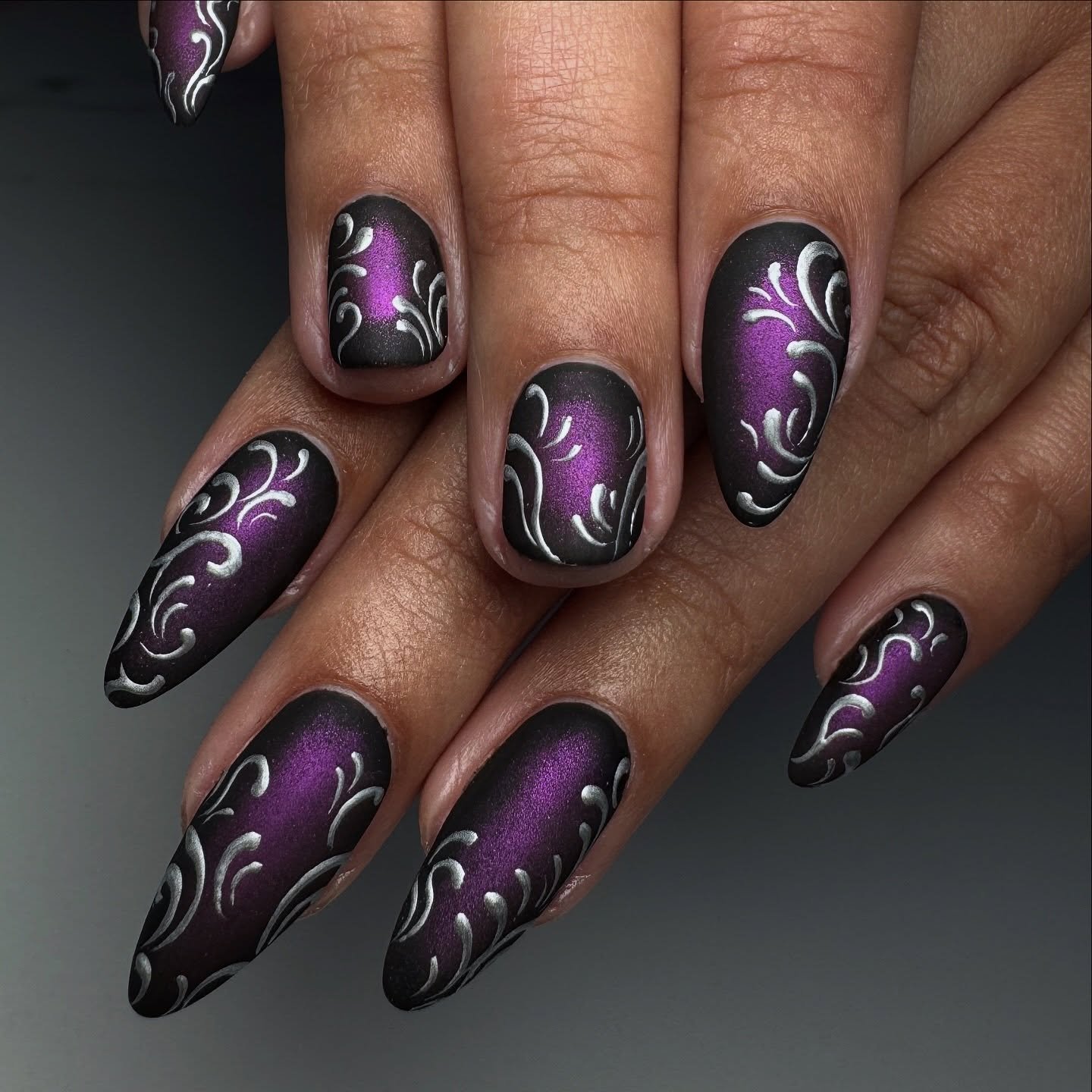 Purple Swirl Nail Art on Dark Bases
