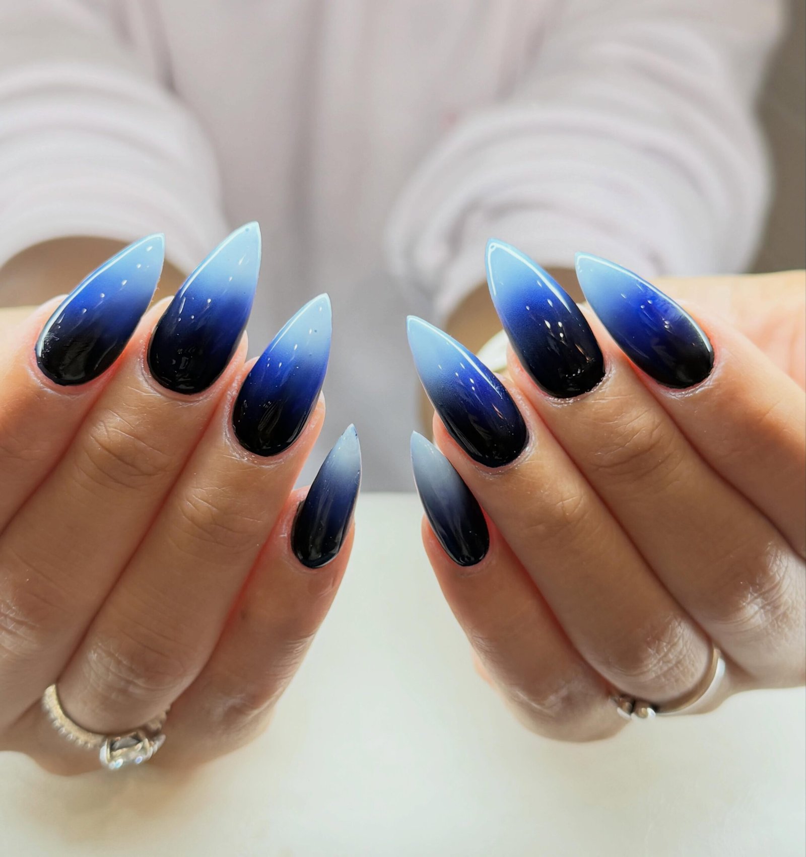 Blue Aura French Stiletto Nails