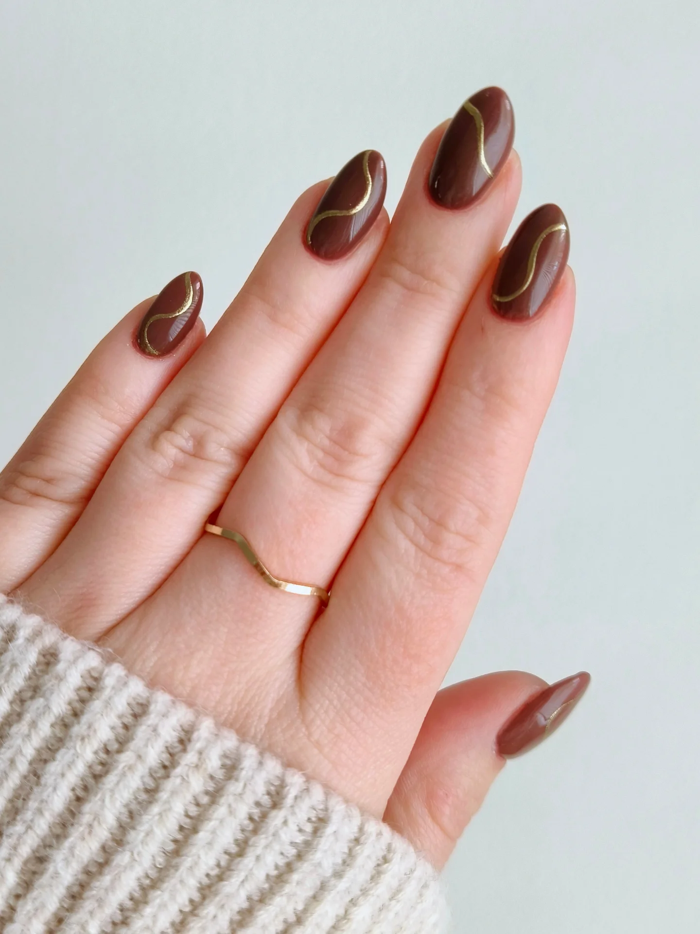 Glossy Chocolate Almond Nails with a Simple Two-Tone Finish
