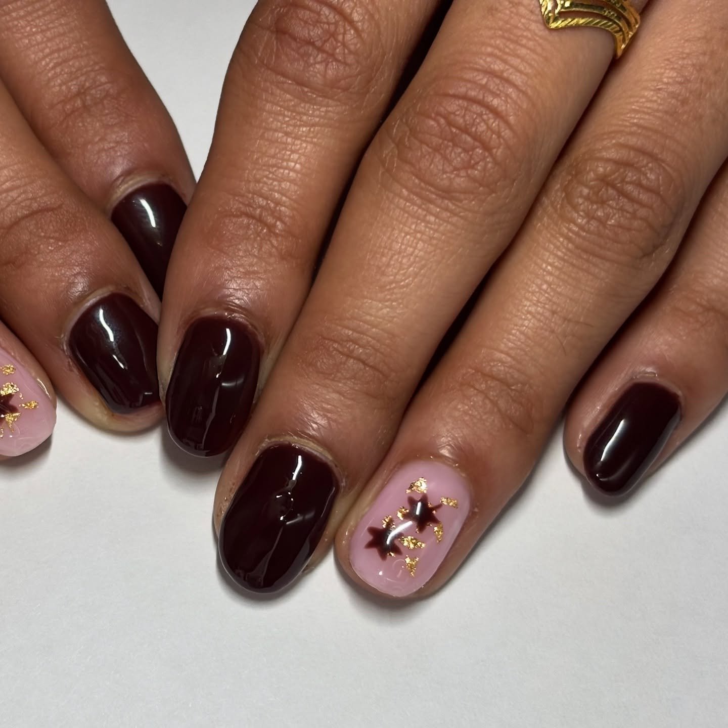 Short Deep Burgundy Nails with a Pink Floral Accent