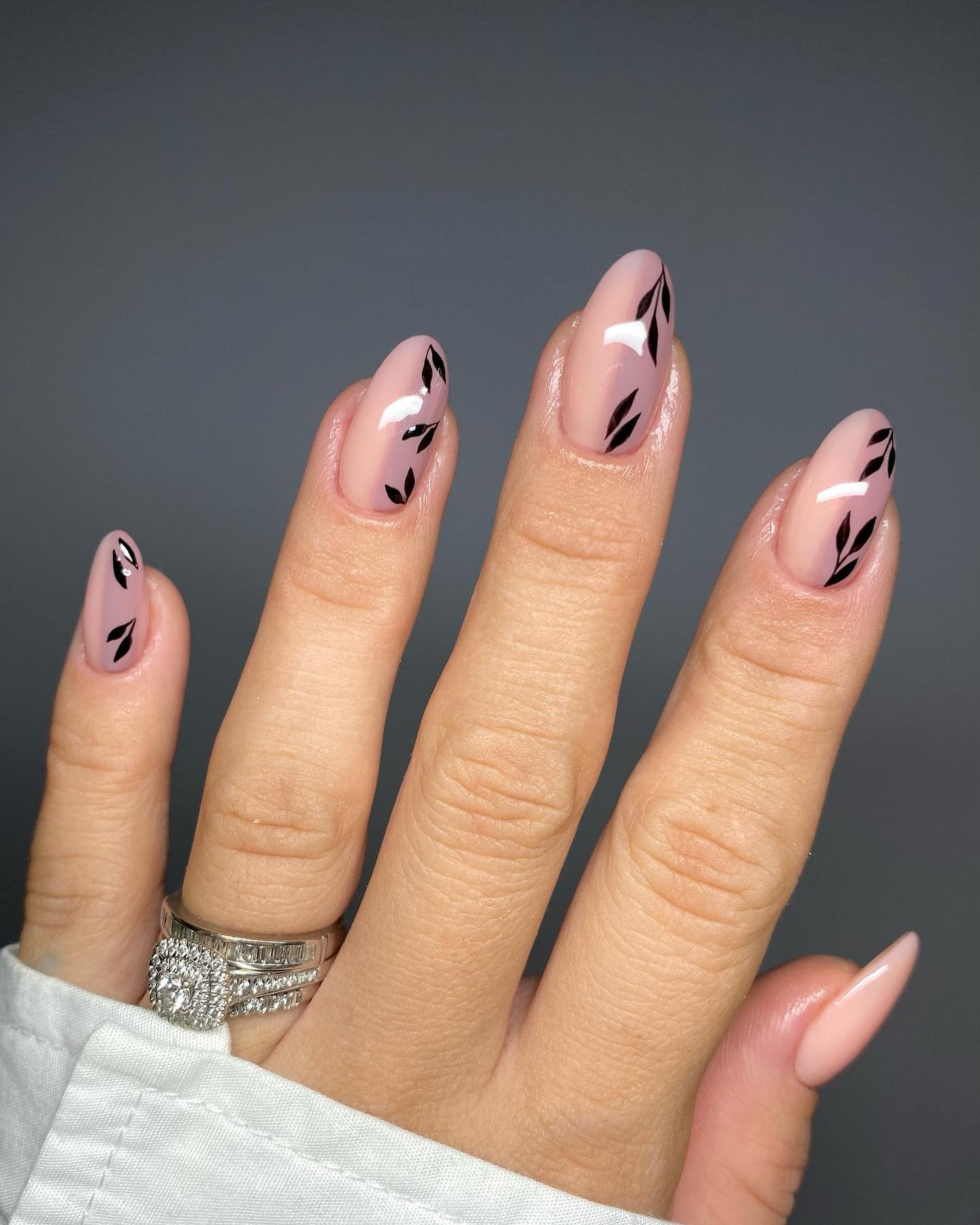 Blush Almond Nails with Minimal Black Abstract Marks