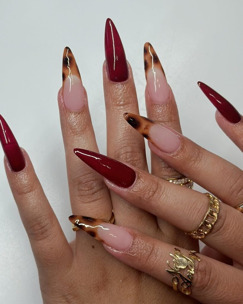 Deep Red Stiletto Nails with Nude and Tortoiseshell Accents