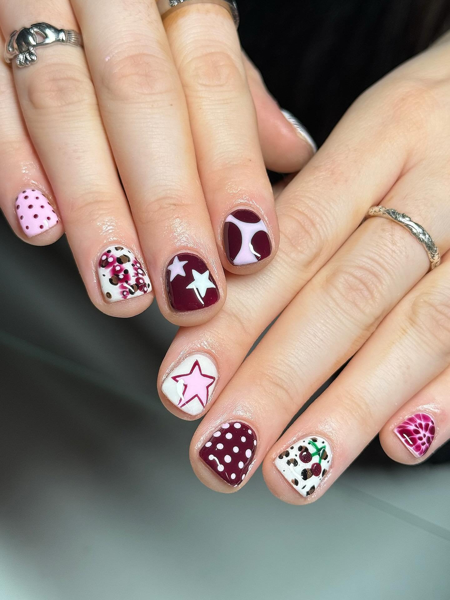 Burgundy, Pink, Cream, and Green Patterned Short Nails