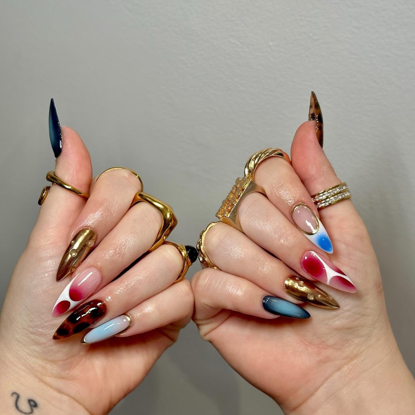Multicolor Long Stiletto Nails with Metallic and Graphic Details