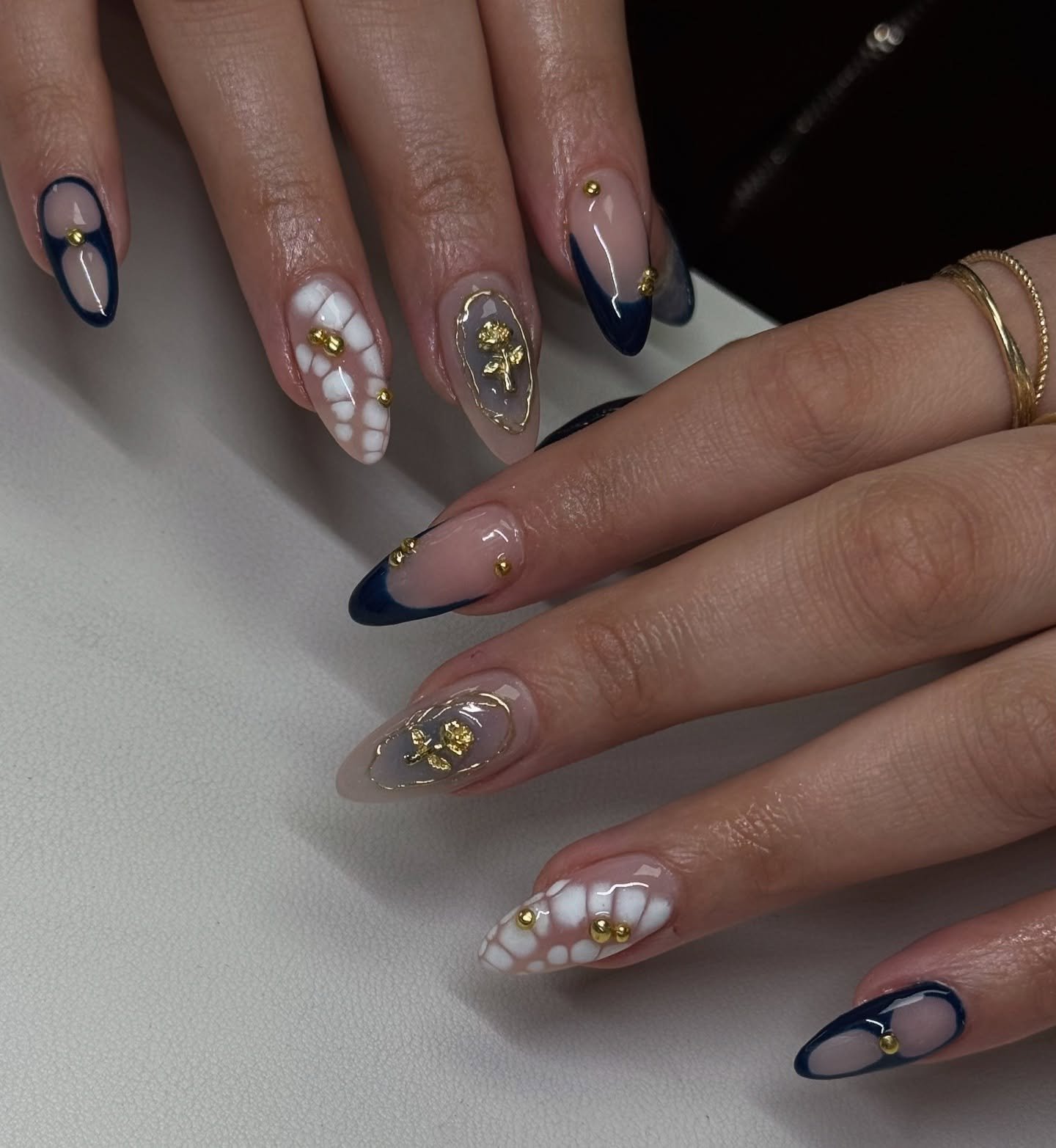 Dark Navy and Gray Almond Nails with Delicate Embellished Details