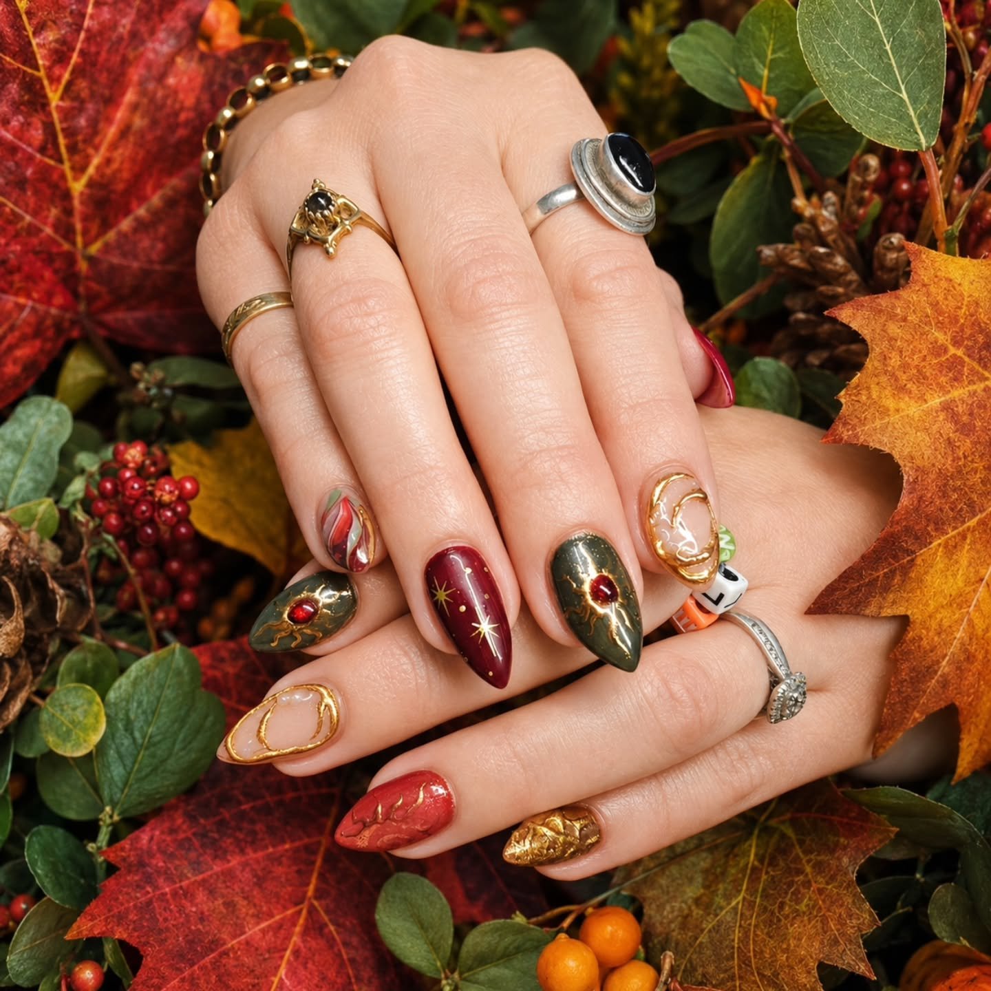 Deep Autumn Almond Nails with Jewel-Tone Accents