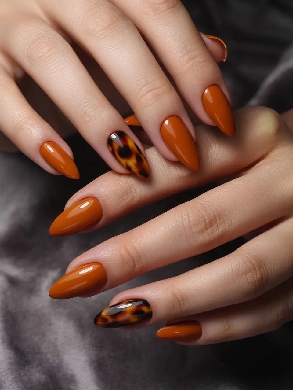 Burnt Orange Stiletto Nails with Tortoiseshell Accents