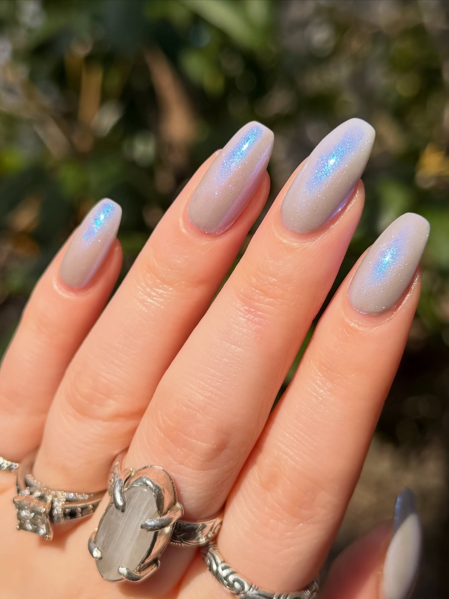 Long Almond Nails with Pale Blue Moonstone Glow