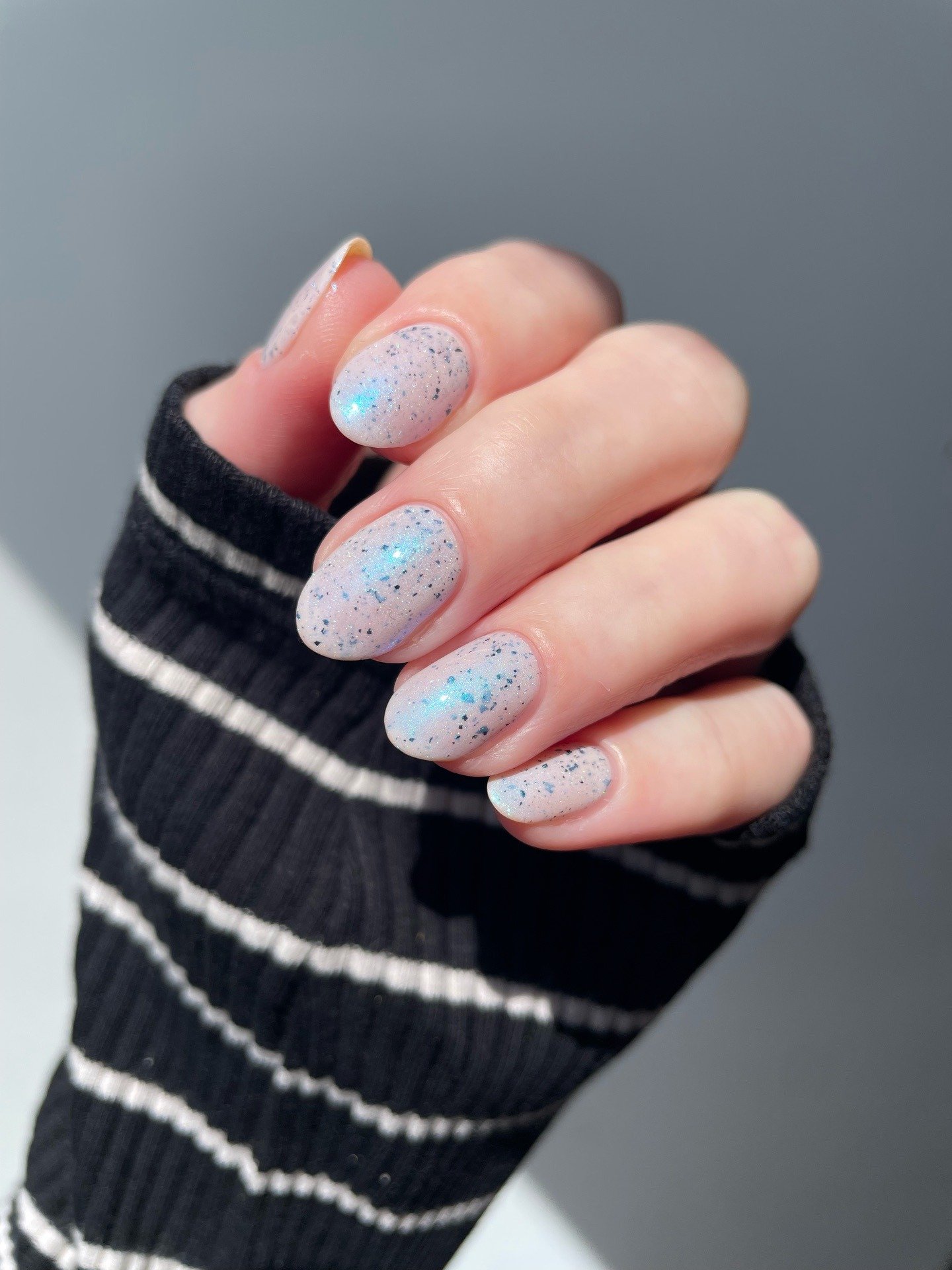 Short Oval Nails with Soft Blue Moonstone Shine