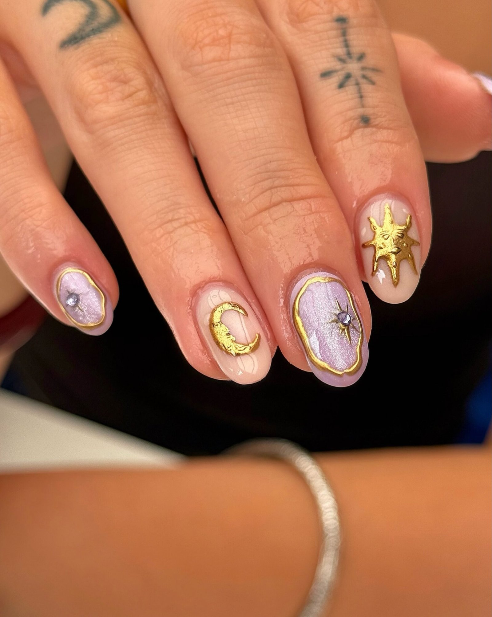 Short Almond Nails with Nude, Gray, and Brown Tones
