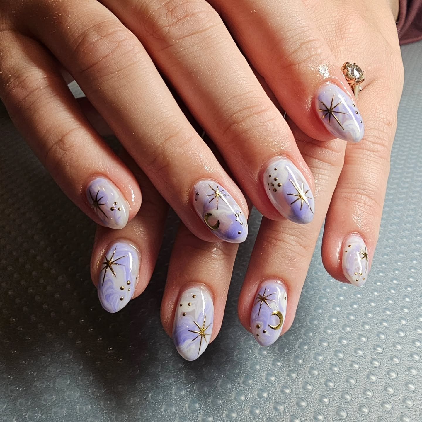 Short Rounded Nails with Sheer Pink and Blue Iridescence