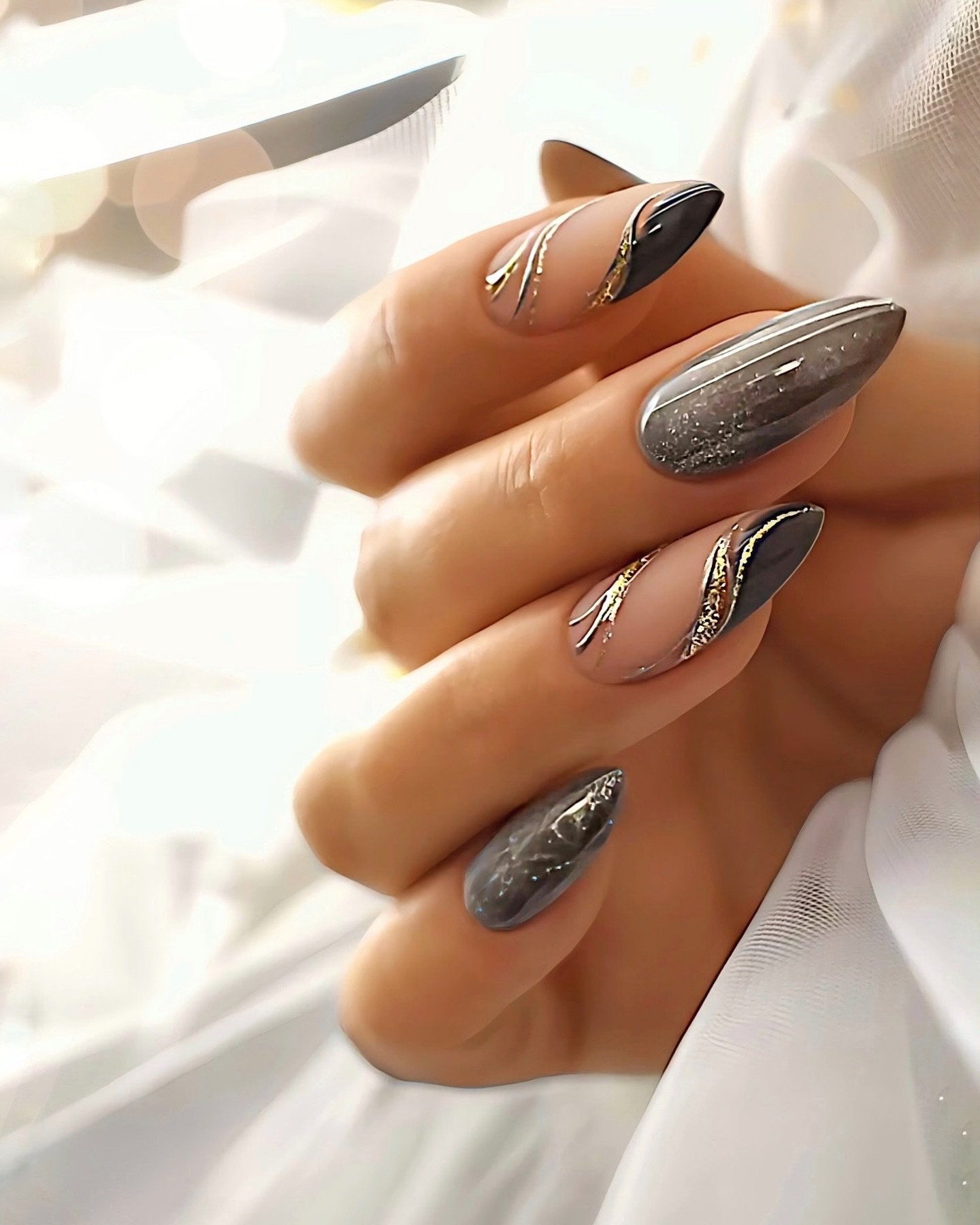 Short Almond Nails with Blue Tips and Floral Accent Art