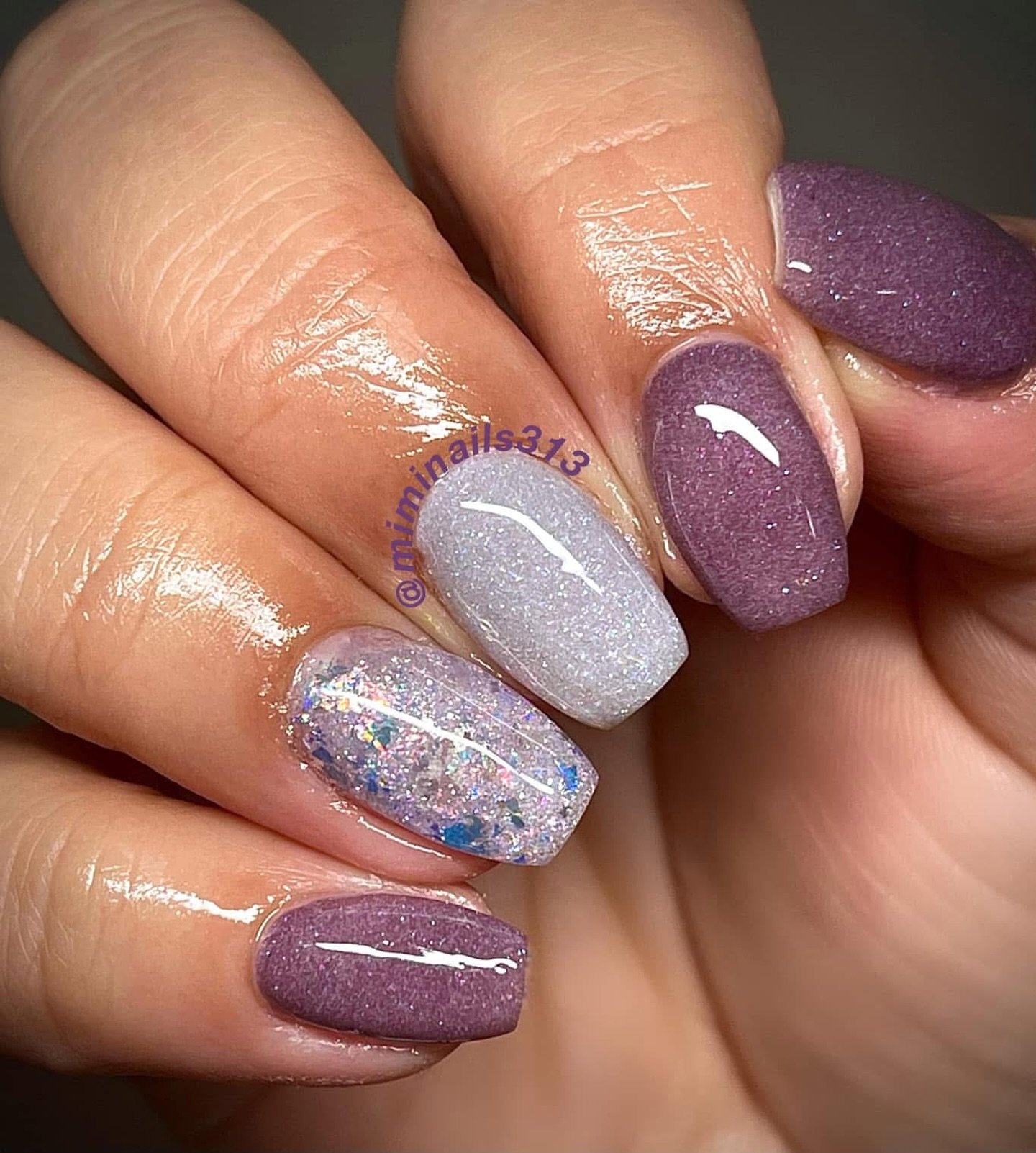 Long Almond Nails with Lavender, White, and Glitter Accents