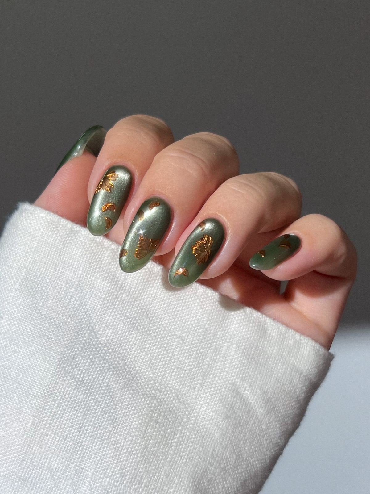 Moss Green Chrome Almond Nails with Gold Accents
