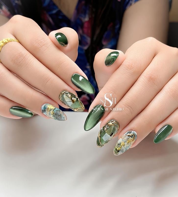 Moss Green Almond Nails with Clear Glitter Accents