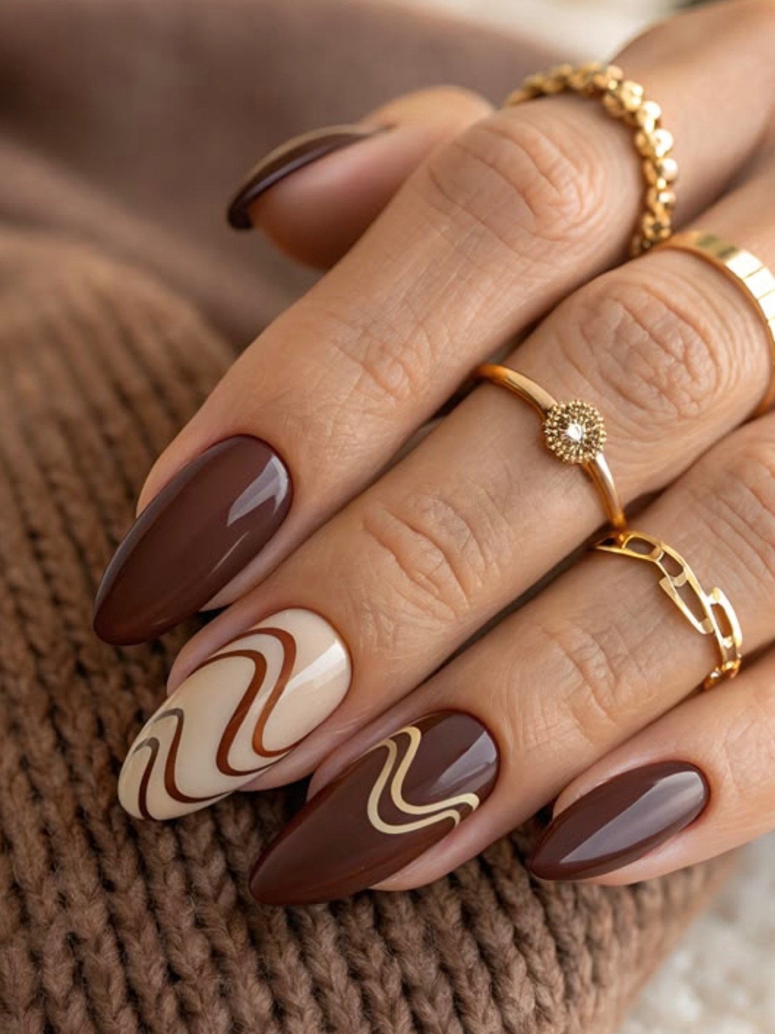 Brown and Nude Swirl Almond Nails