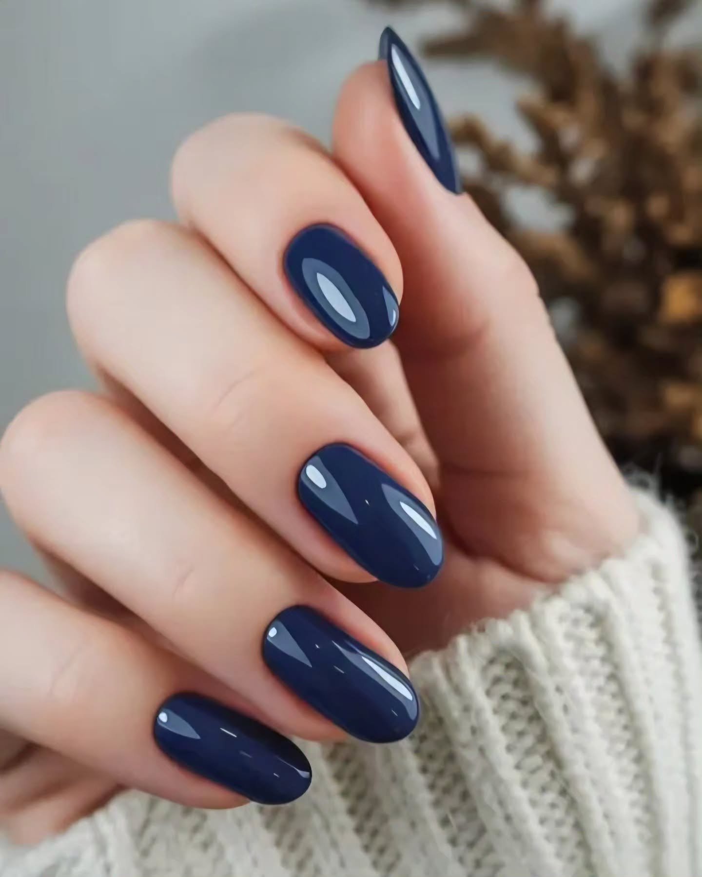 Glossy Blue Almond Nails