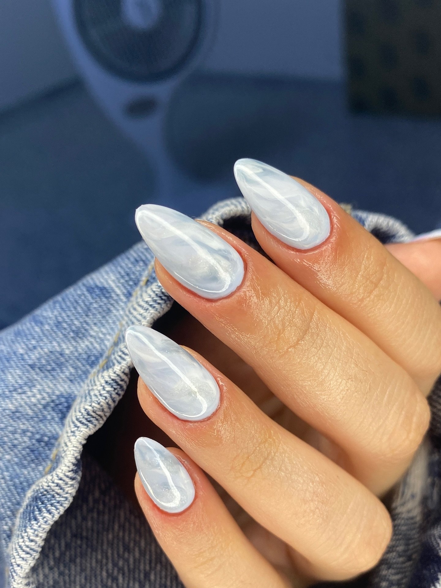 White and Blue Marble Almond Nails