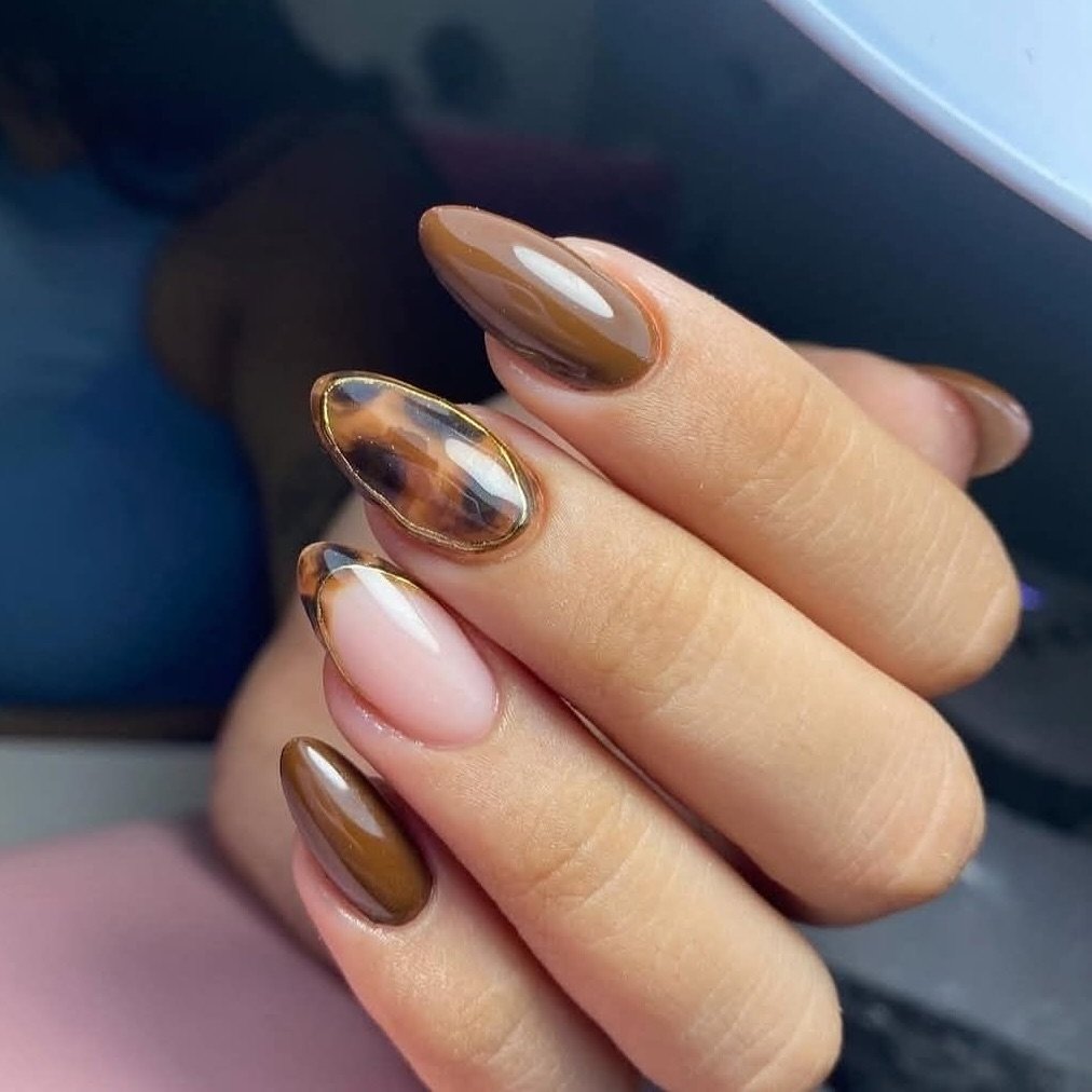 Neutral Almond Nails with Gold Accents