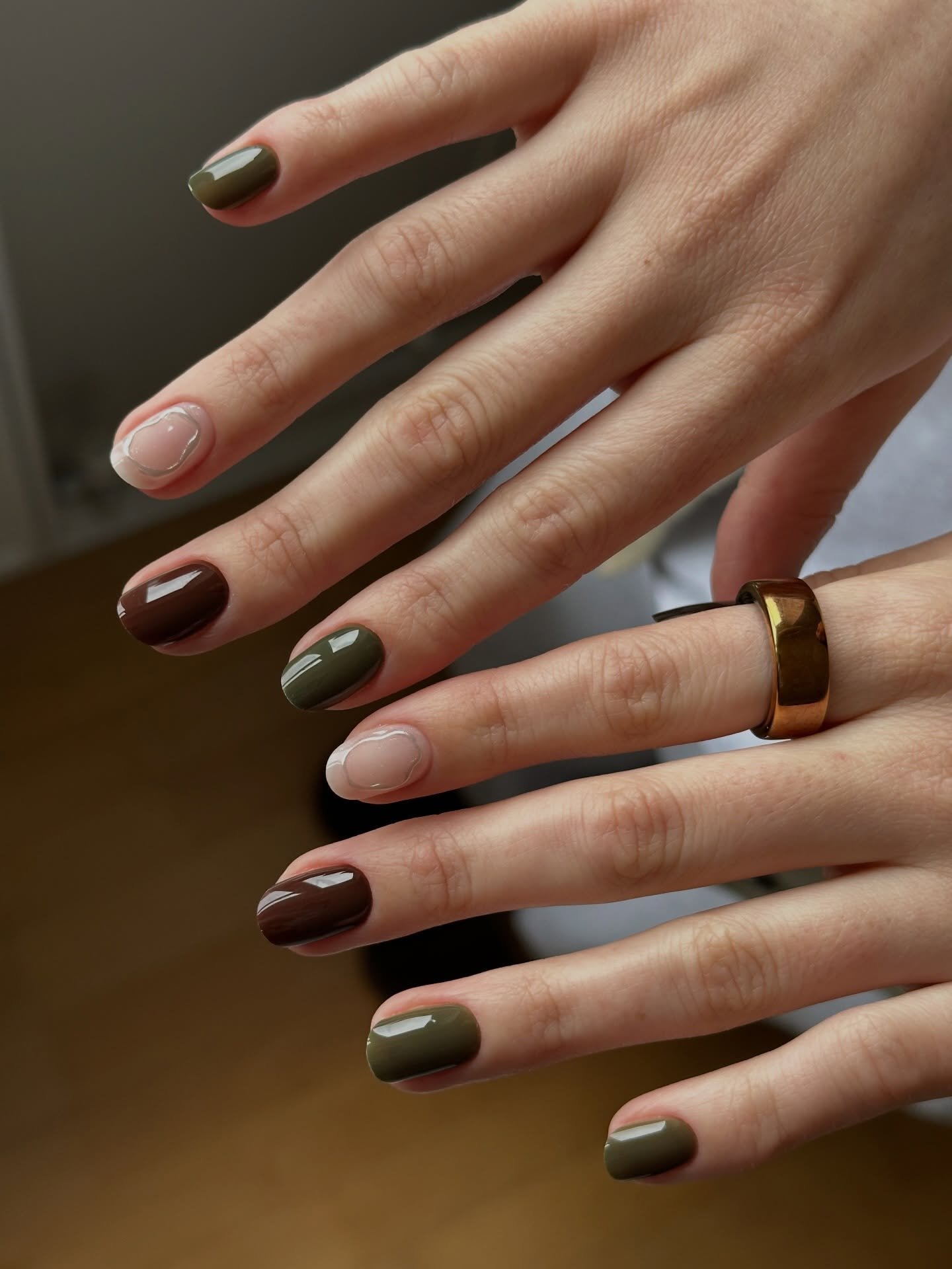 Dark Brown and Green Almond Nails