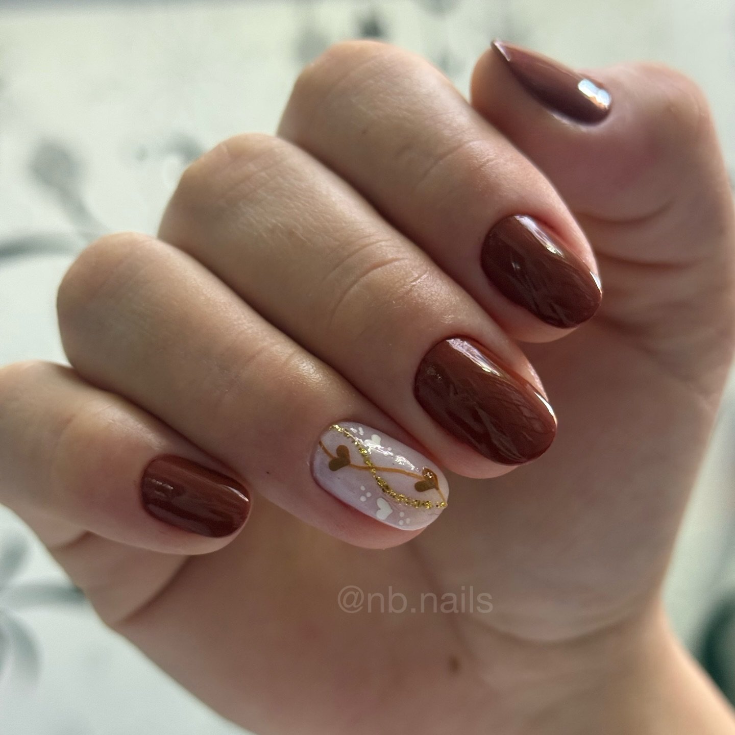 Chocolate Brown Nails with a Marble Accent