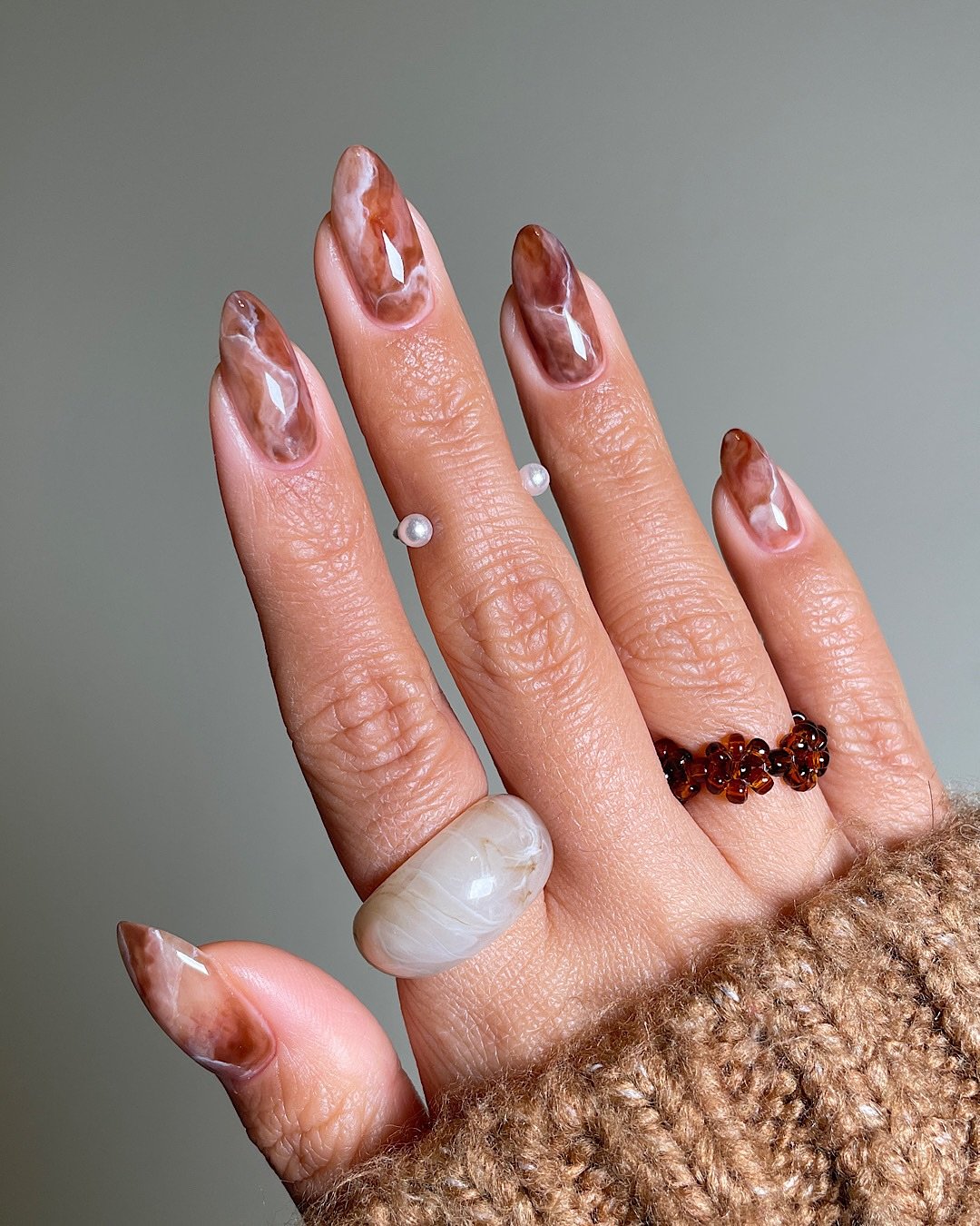 Brown and Pink Almond Nails with Marbled Tips