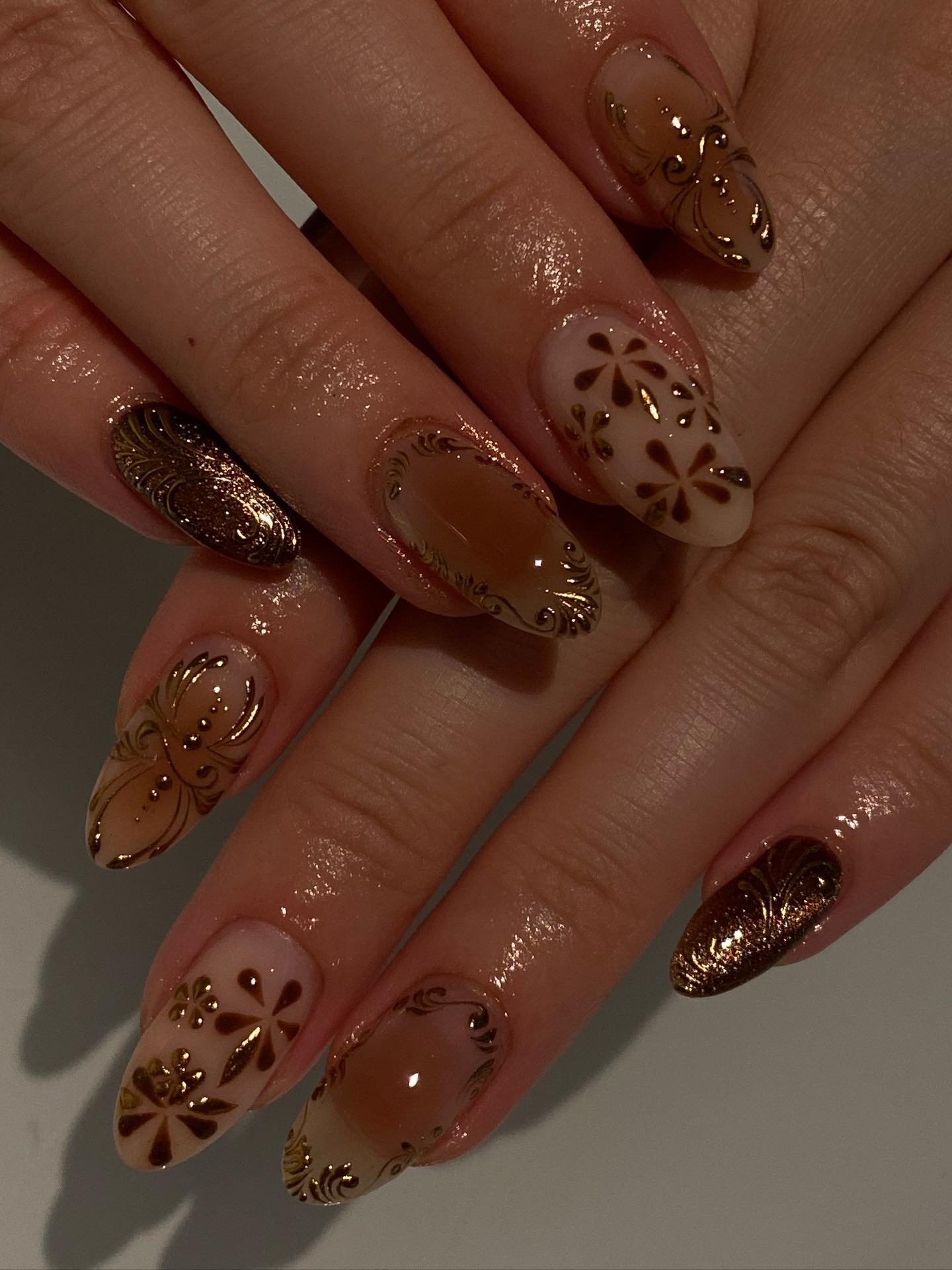 Warm Brown Nails with Gold Floral Details