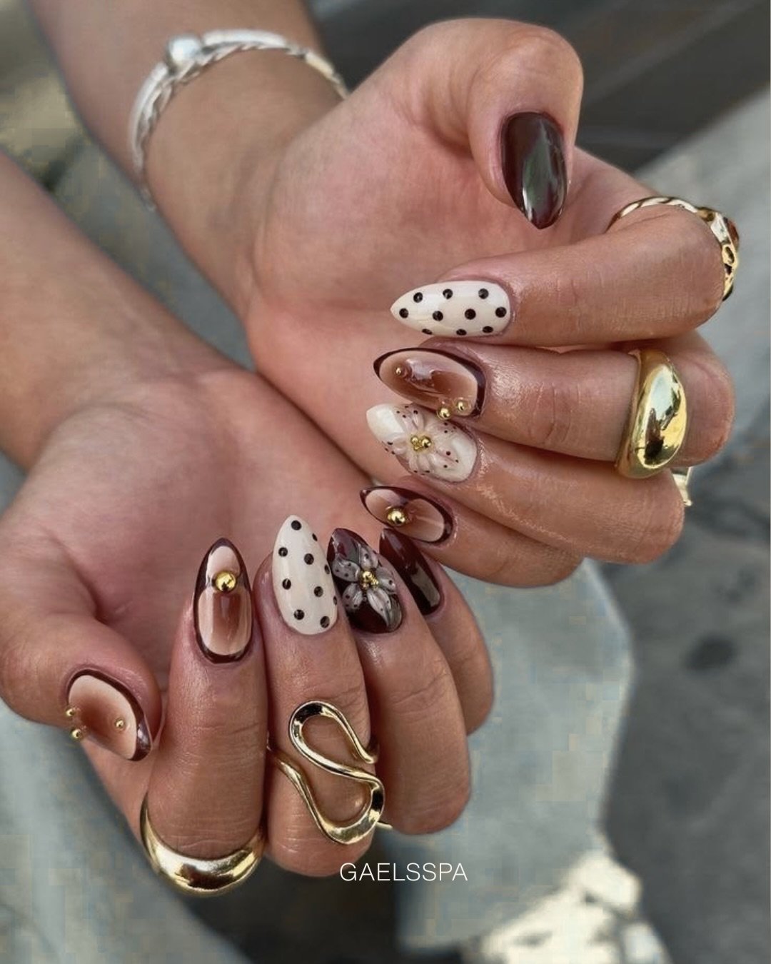 Brown and Nude Almond Nails with Polka Dots and Gold Accents