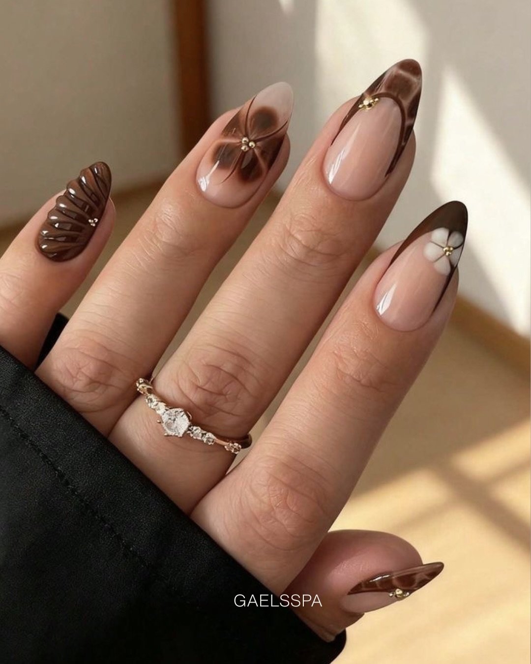 Nude Almond Nails with Brown Tips and Fine Line Details