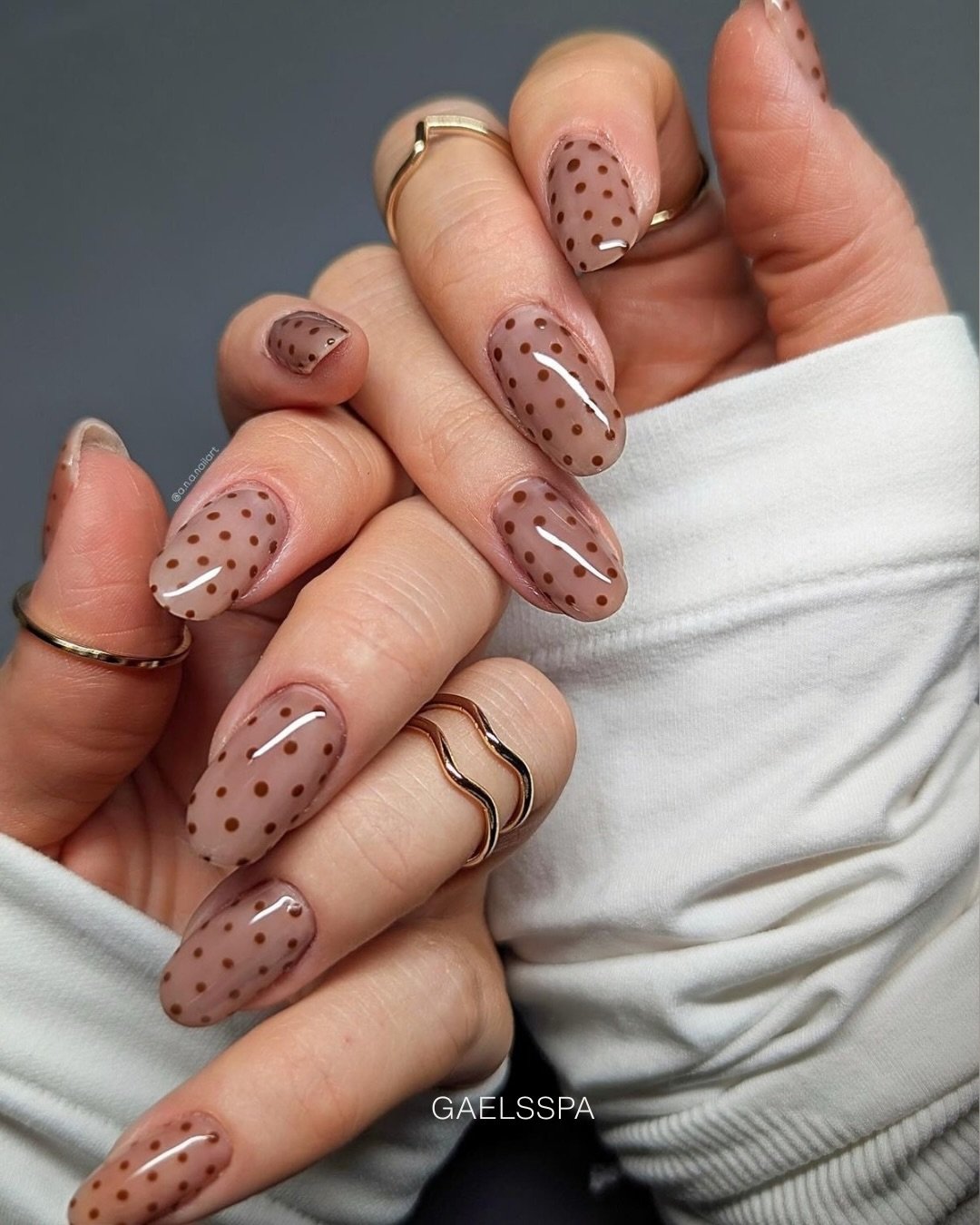 Sheer Brown Almond Nails with Polka Dots