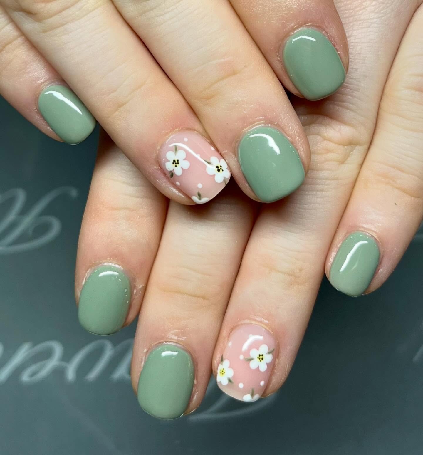 Mint Green Nails with Small White Flower Accents — C5Ao4RpssGANails & Beauty by Daisy.jpg