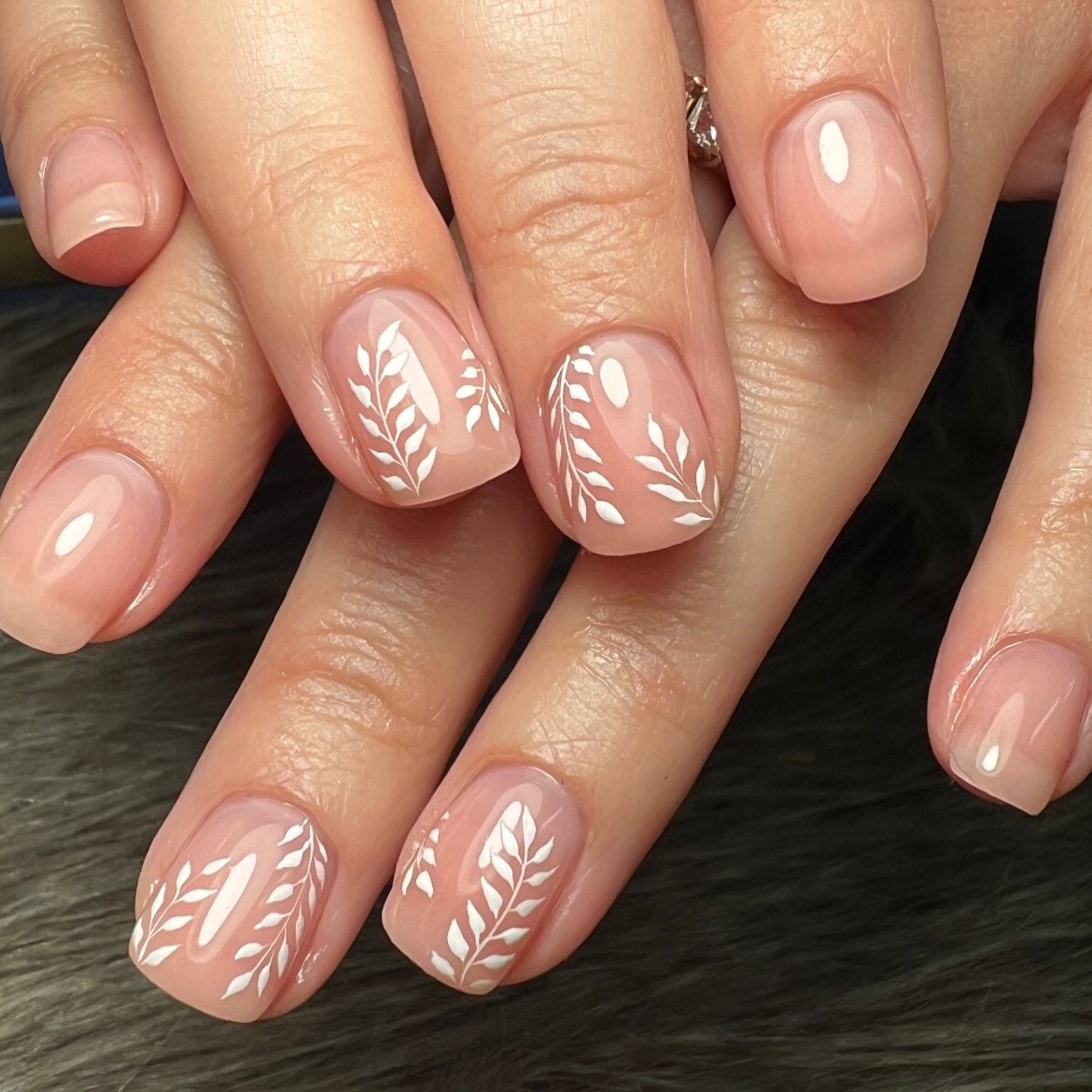 Blush Nude Nails with White Leaf Motifs — DVtCoxKkayCR E X A S C L A W S.jpg