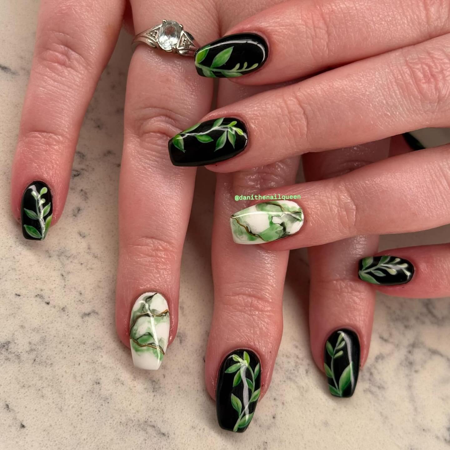 Black Nails with Bright Green Leaf Designs — DHj0EaVy3LODanielle Quach.jpg