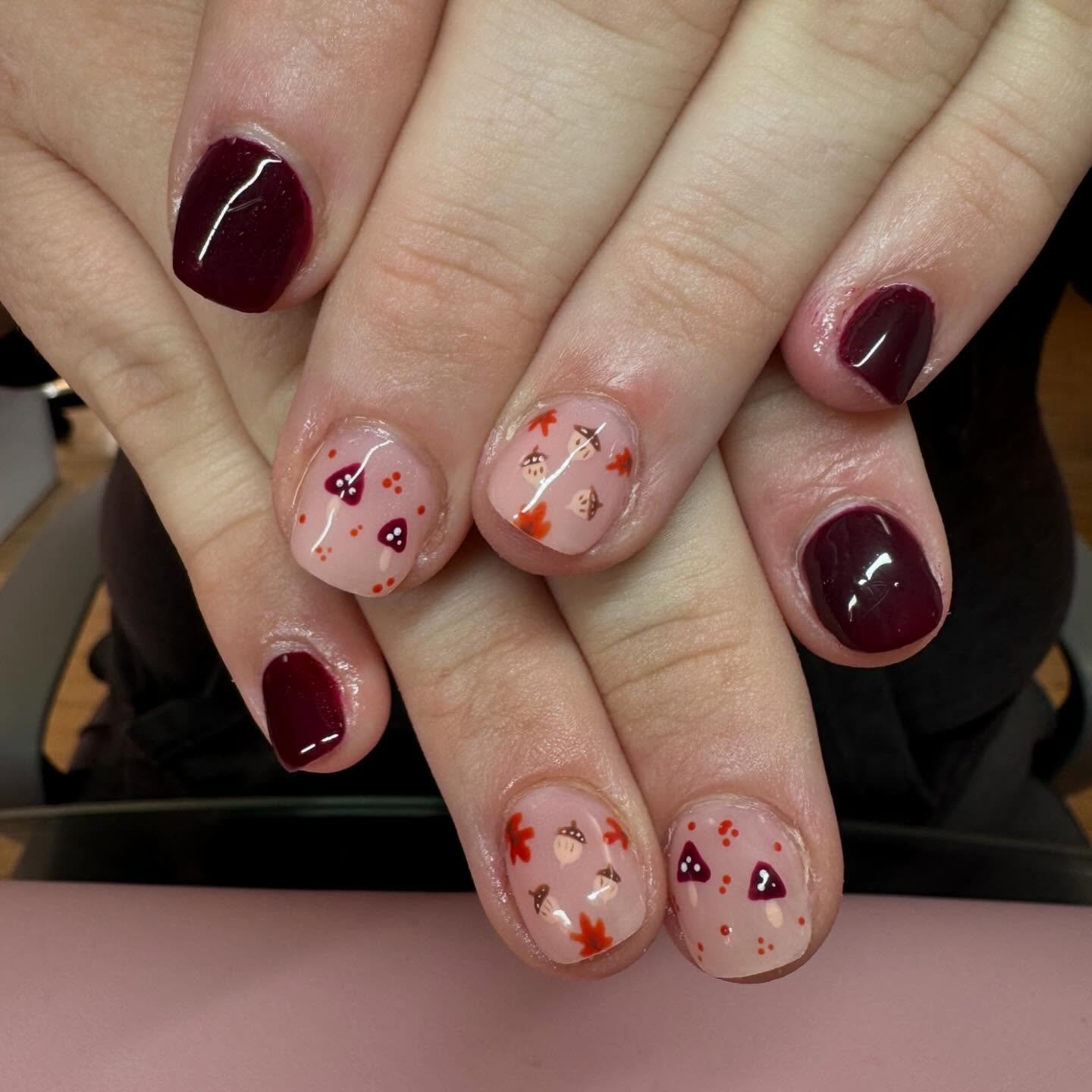 Burgundy Nails with Tiny Red and Green Floral Details — DDAB3kcRMi7Alissa Gagne.jpg
