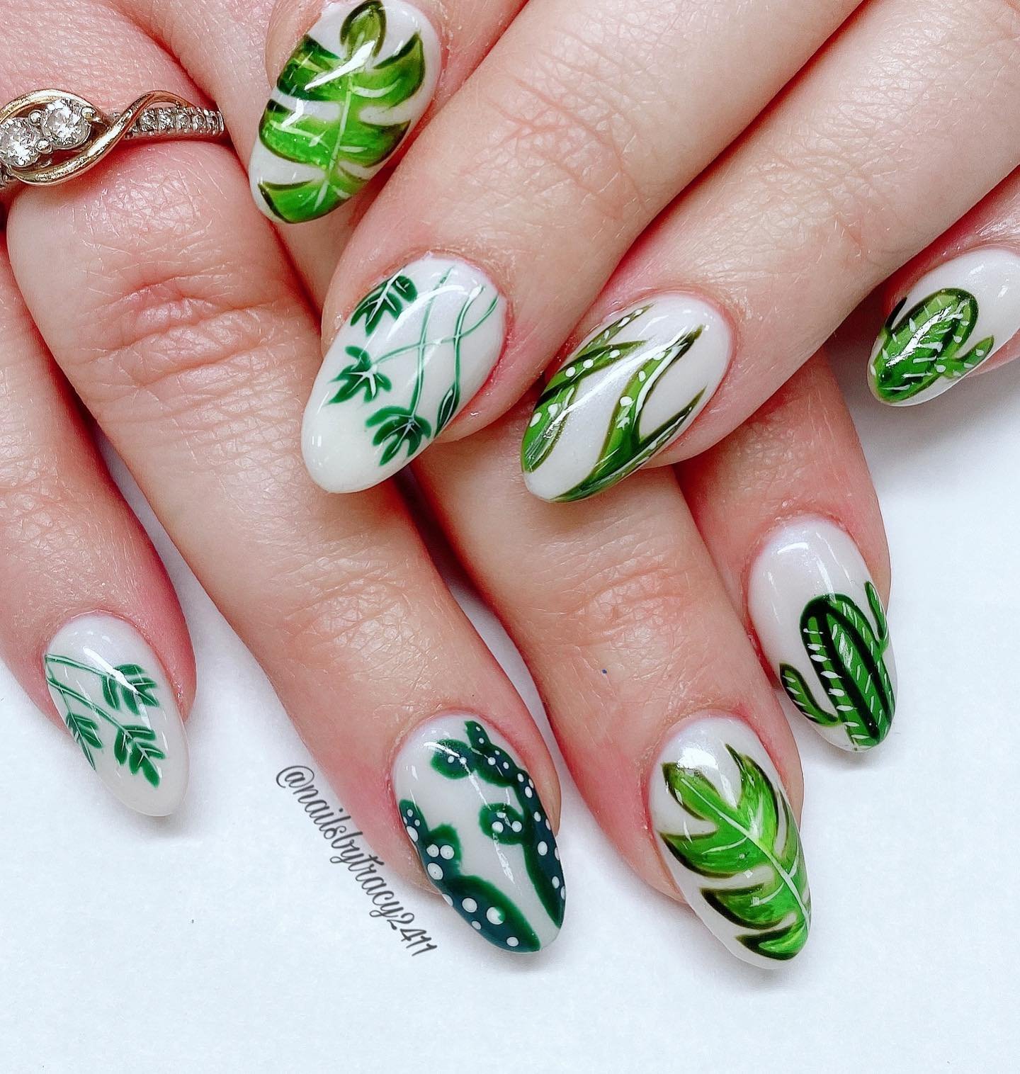 White and Green Nails with Tropical Leaf Designs — CbQ0p6-rcKPTracy Nguyen.jpg