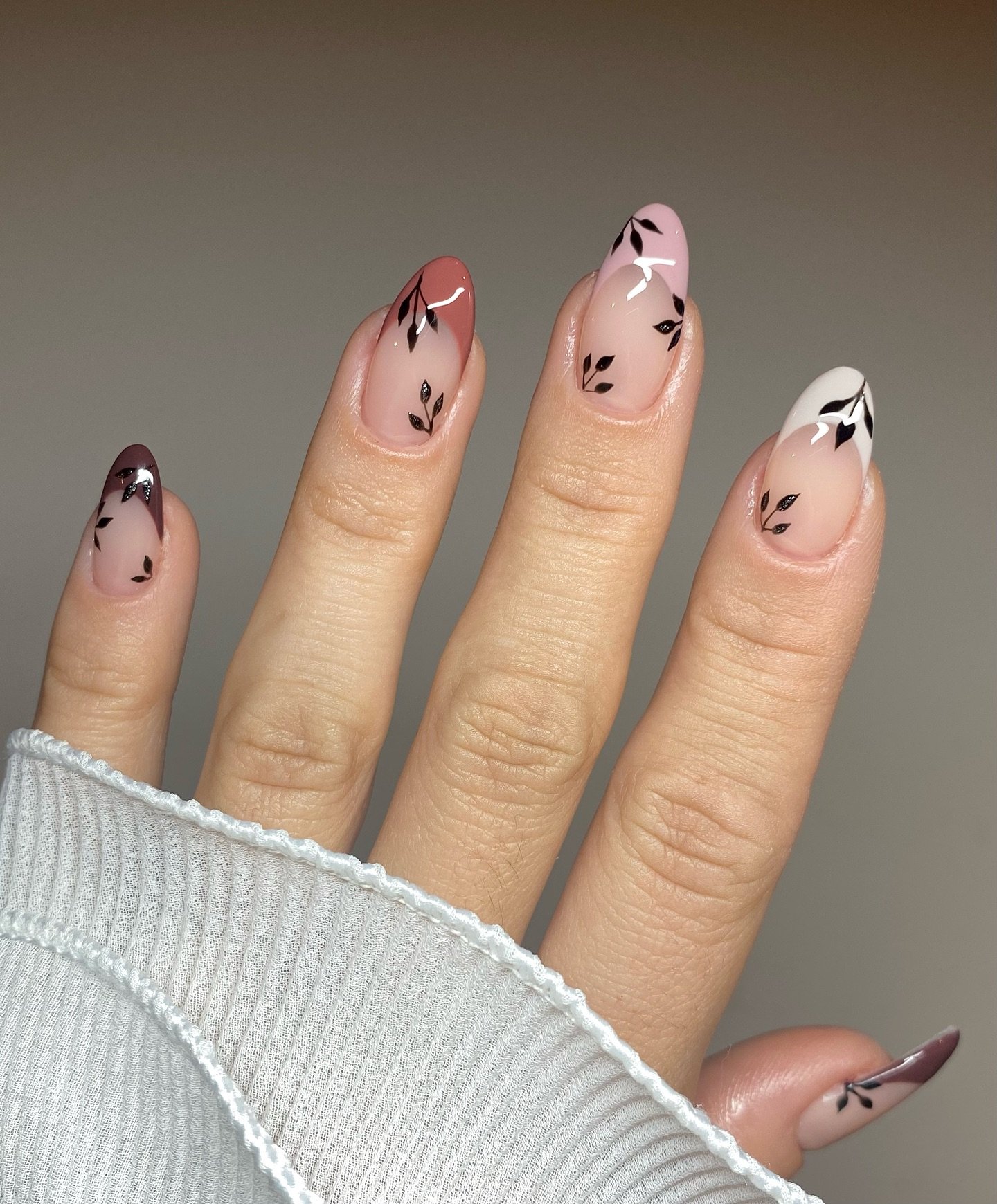 Soft Nude Almond Nails with Tiny Abstract Details